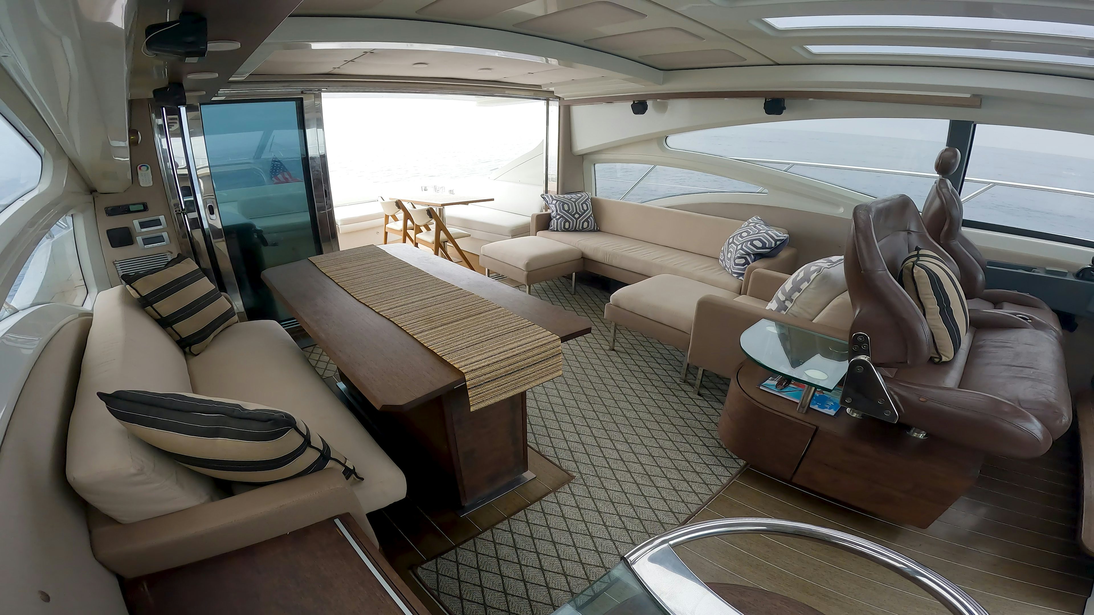 a room with a couch and a television aboard BOAT Yacht for Sale