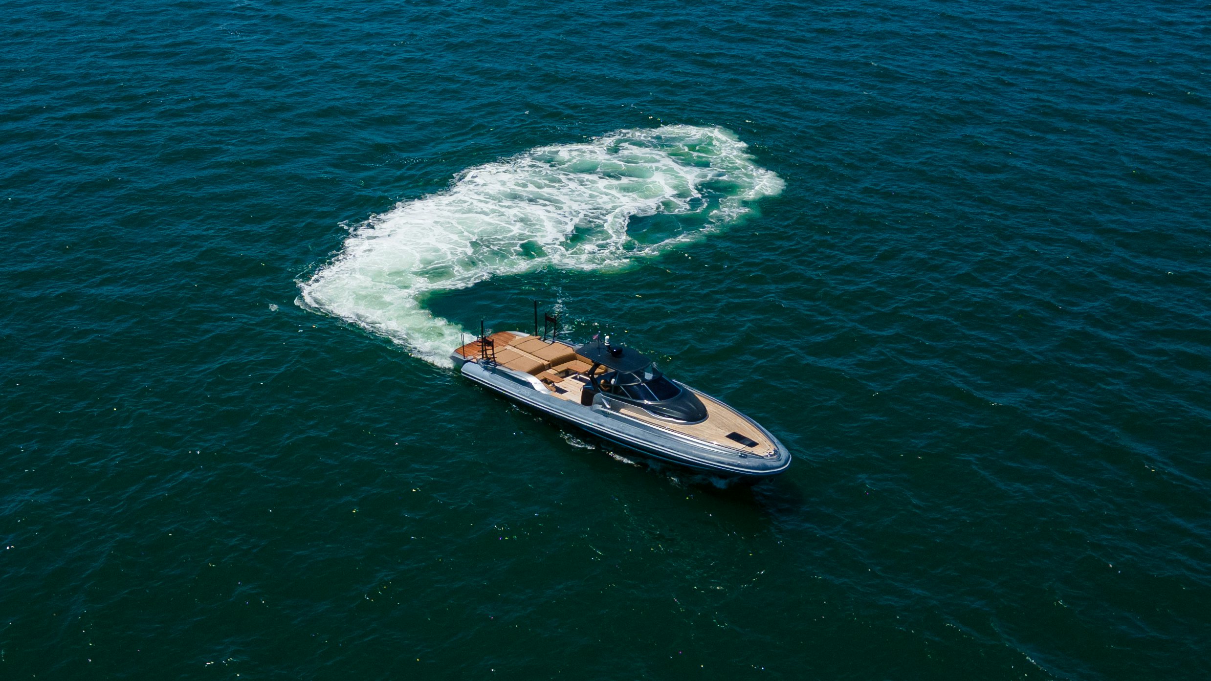 a boat in the water aboard QUIKWOOD Yacht for Sale