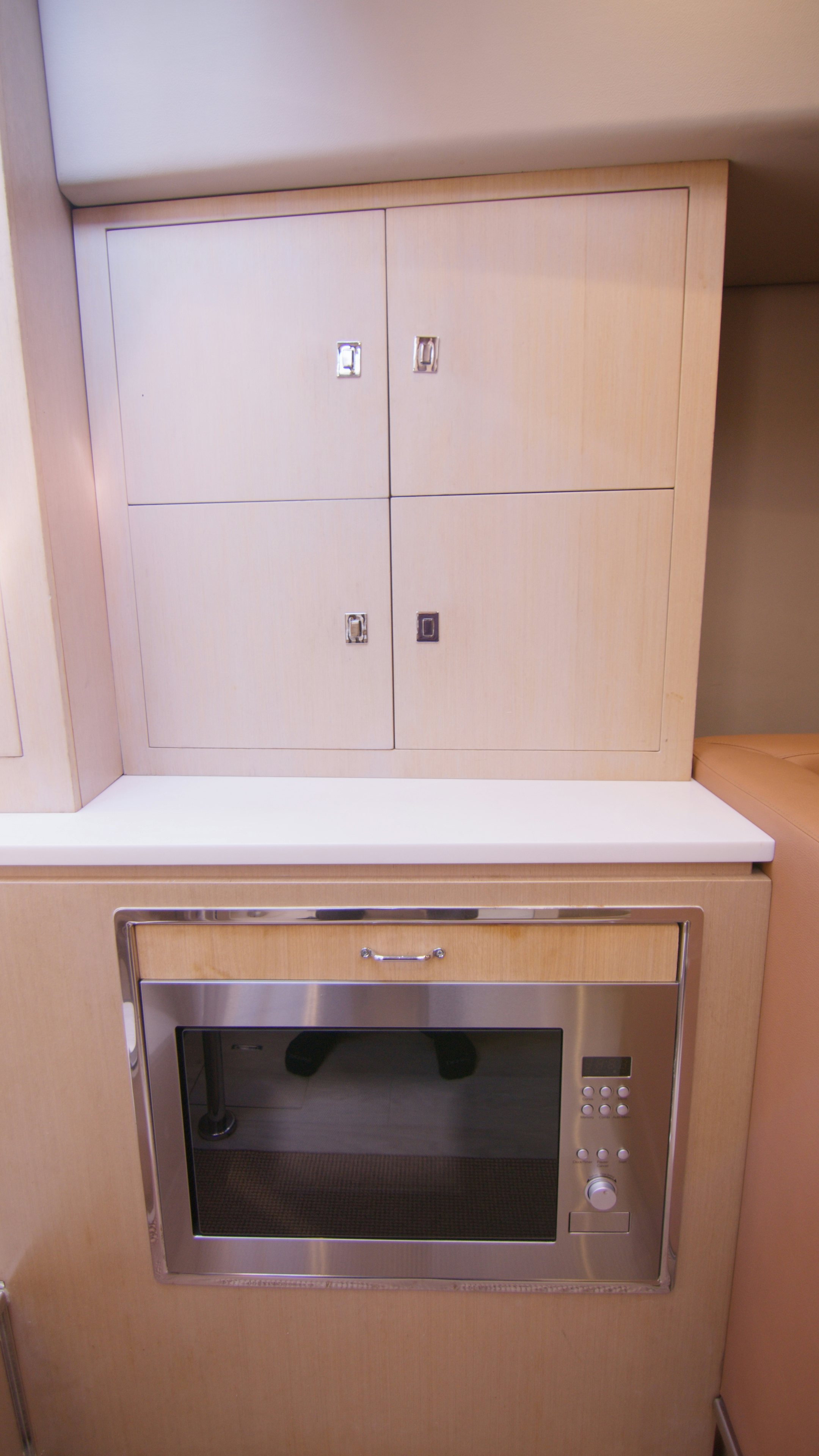 a microwave oven in a kitchen aboard QUIKWOOD Yacht for Sale