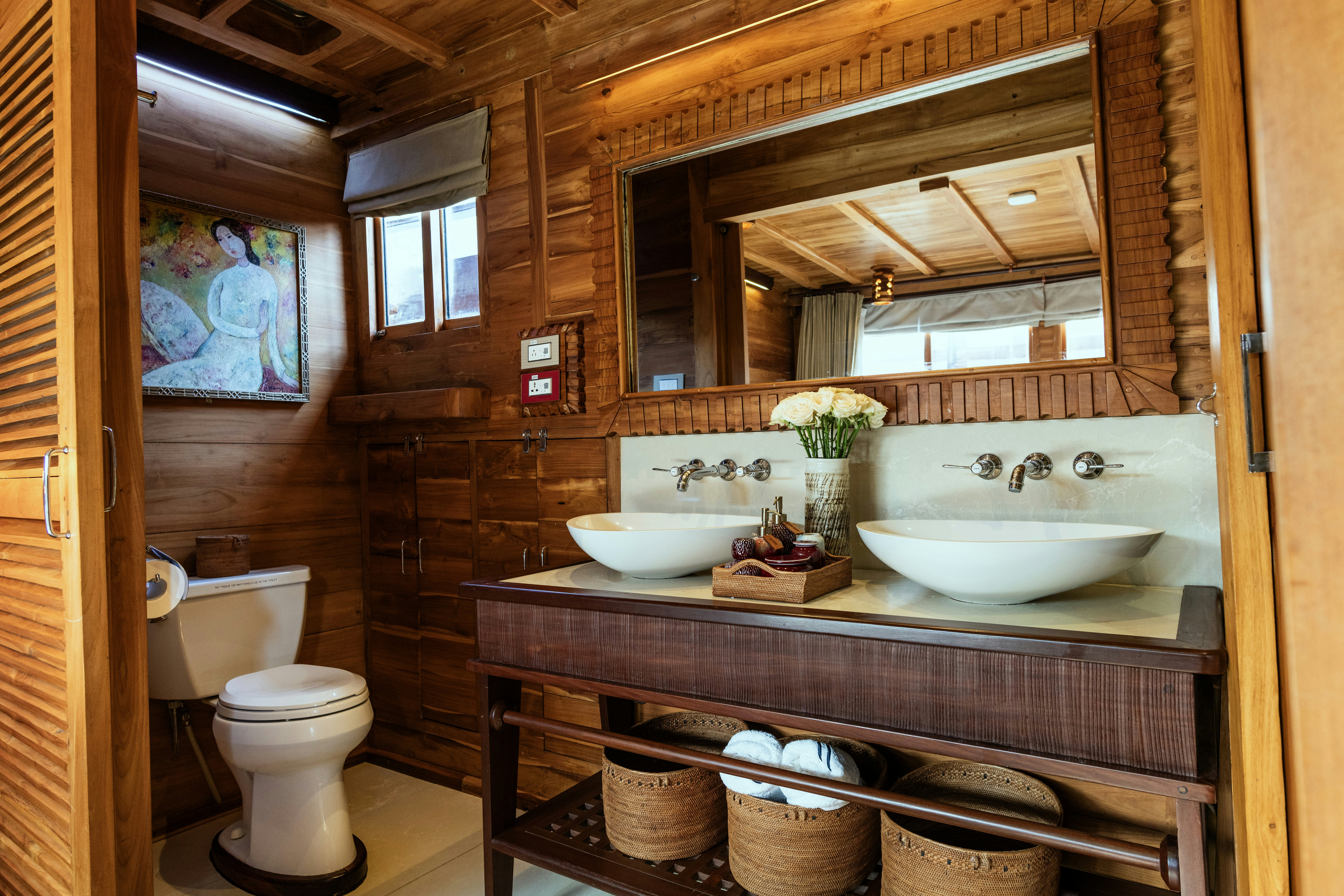 a bathroom with a sink and toilet aboard SEQUOIA Yacht for Charter