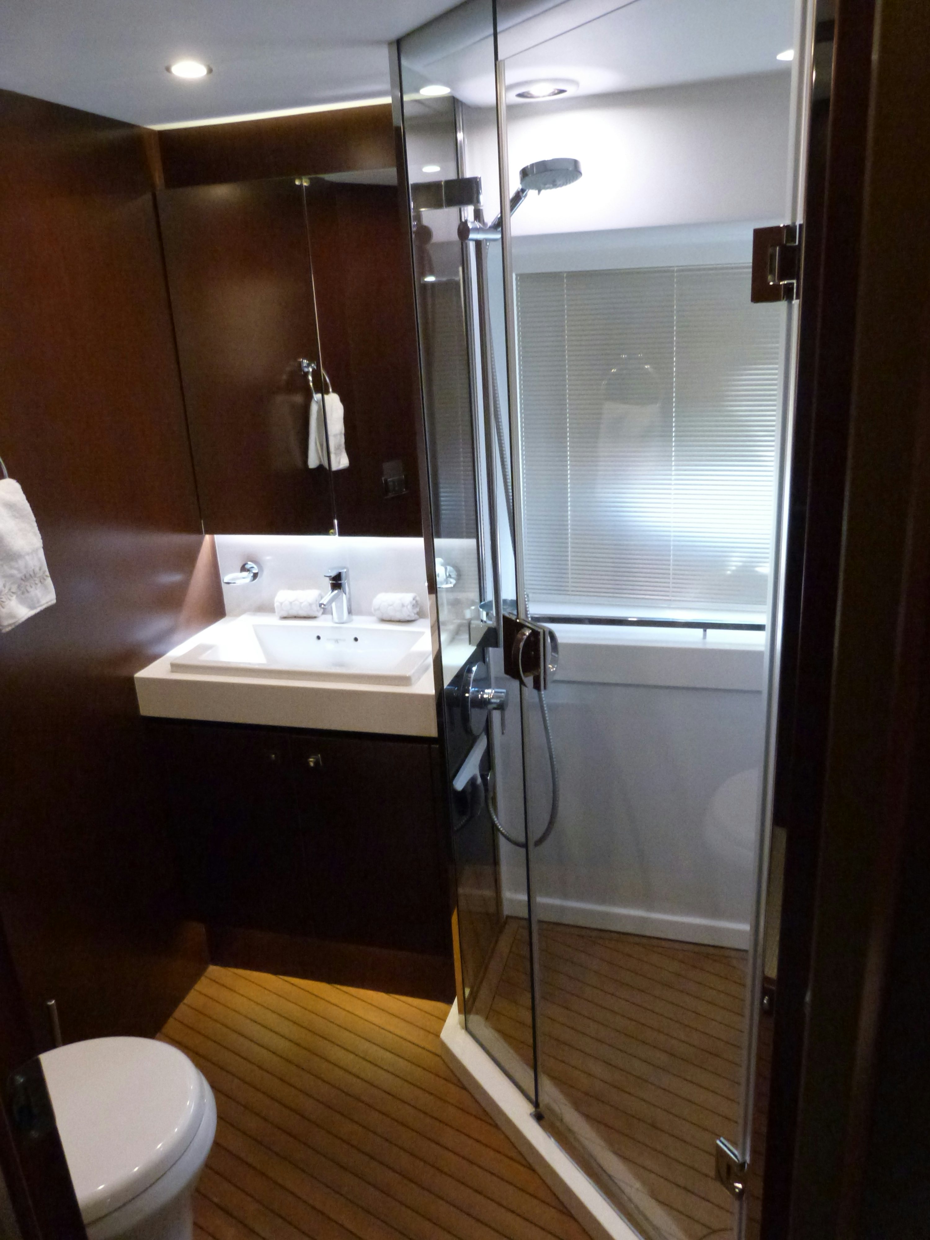 a kitchen with a large mirror aboard LADY A Yacht for Sale