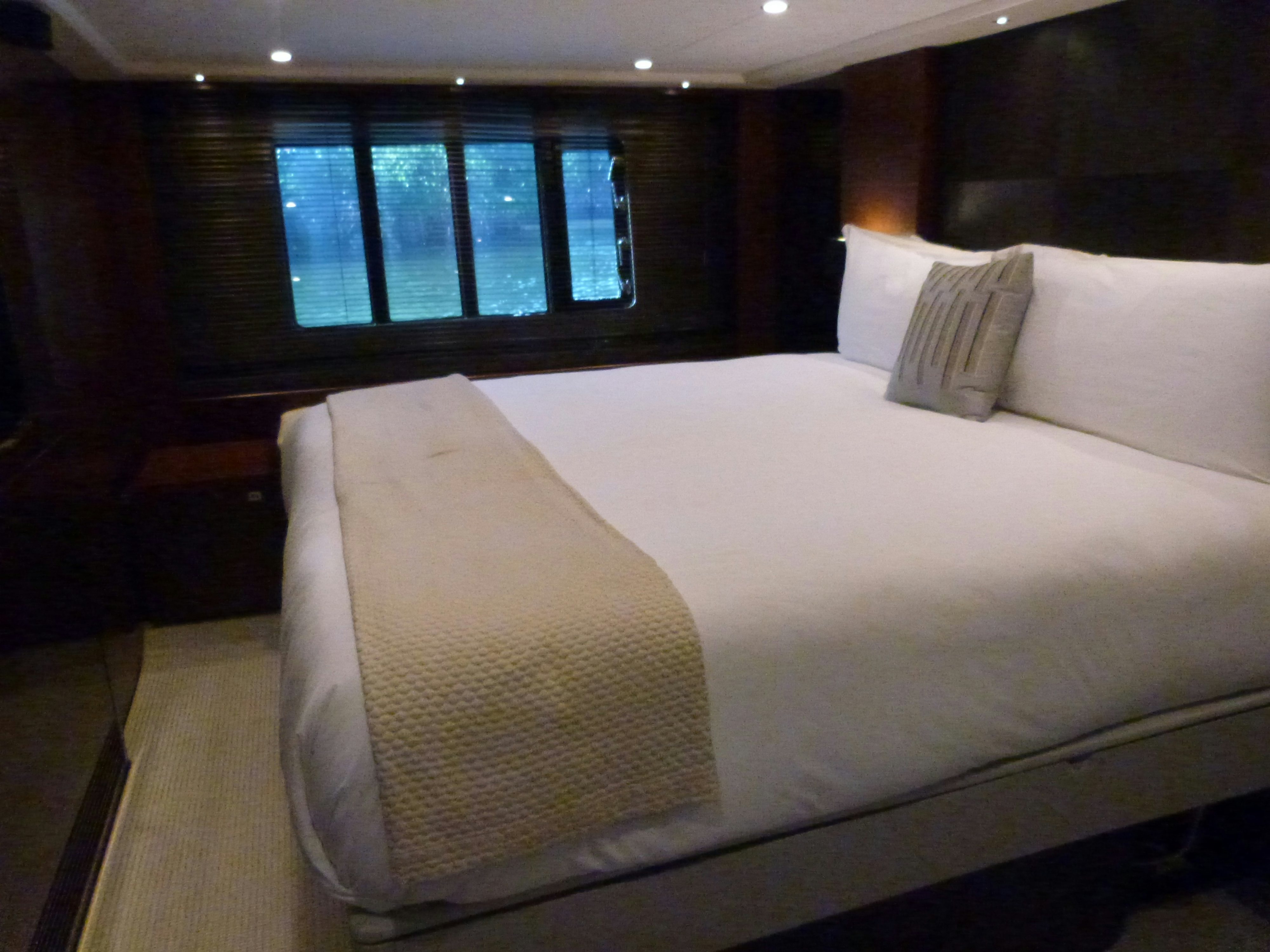 a bed with pillows aboard LADY A Yacht for Sale
