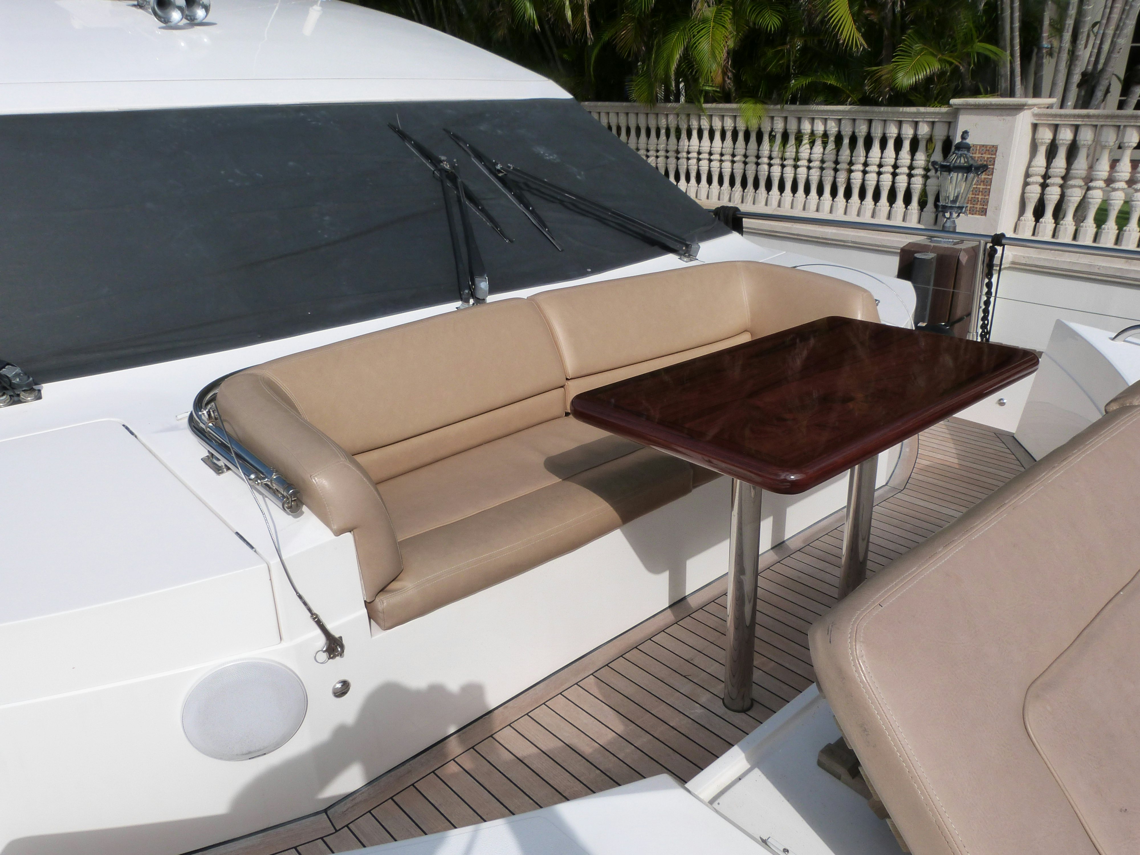 a table with a chair on it aboard LADY A Yacht for Sale