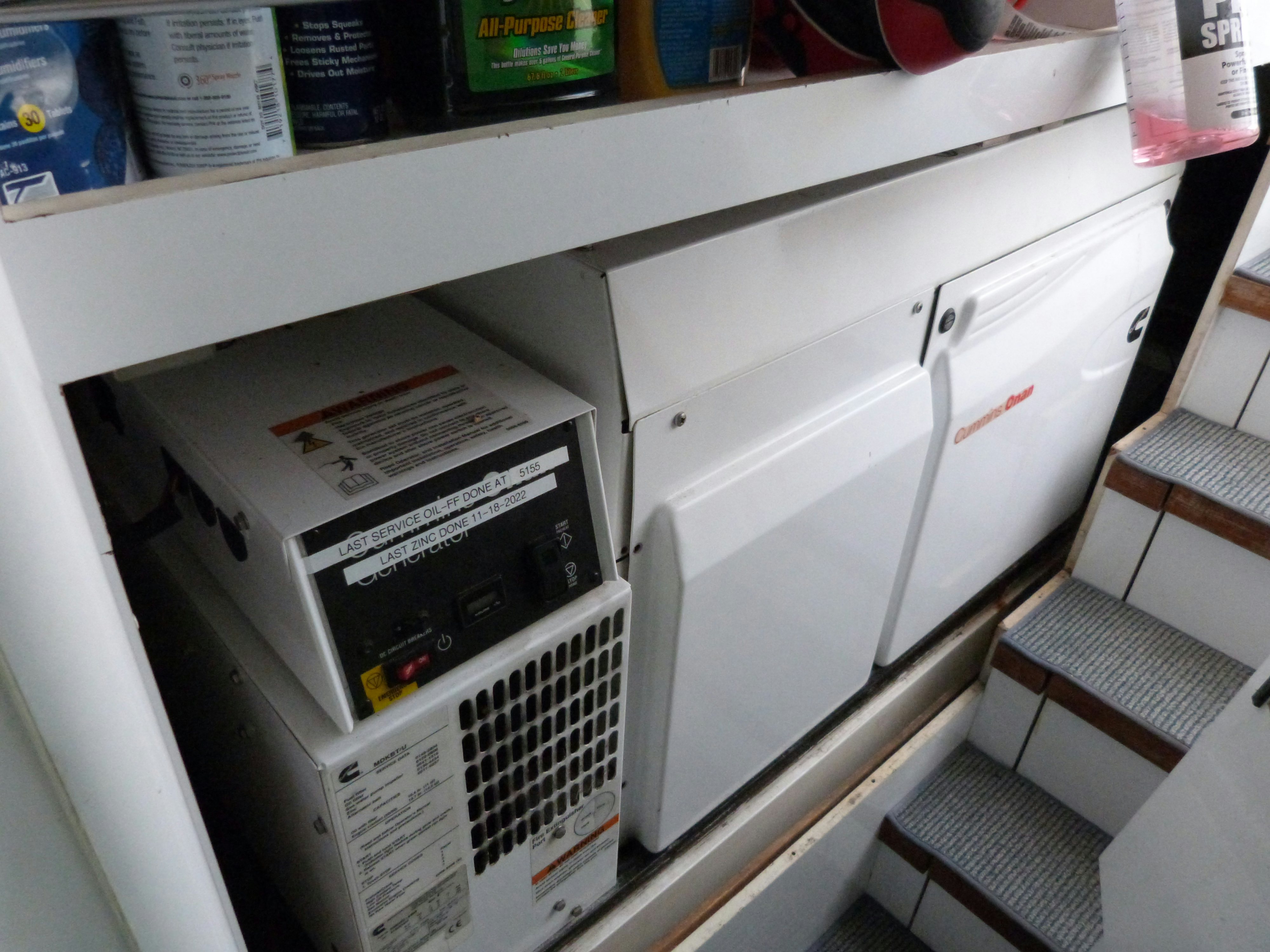 a white cabinet with a sign on it aboard LADY A Yacht for Sale