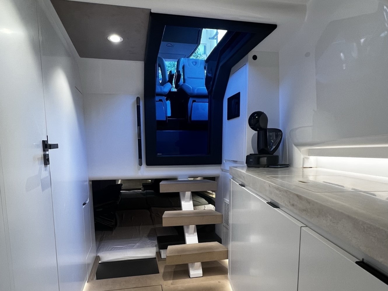 a room with a large tv aboard MONEYPENNY Yacht for Sale