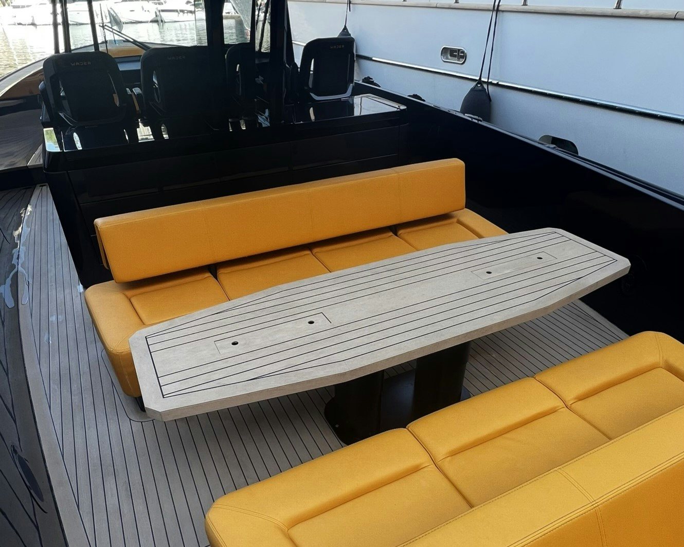 a wooden boat on a deck aboard MONEYPENNY Yacht for Sale