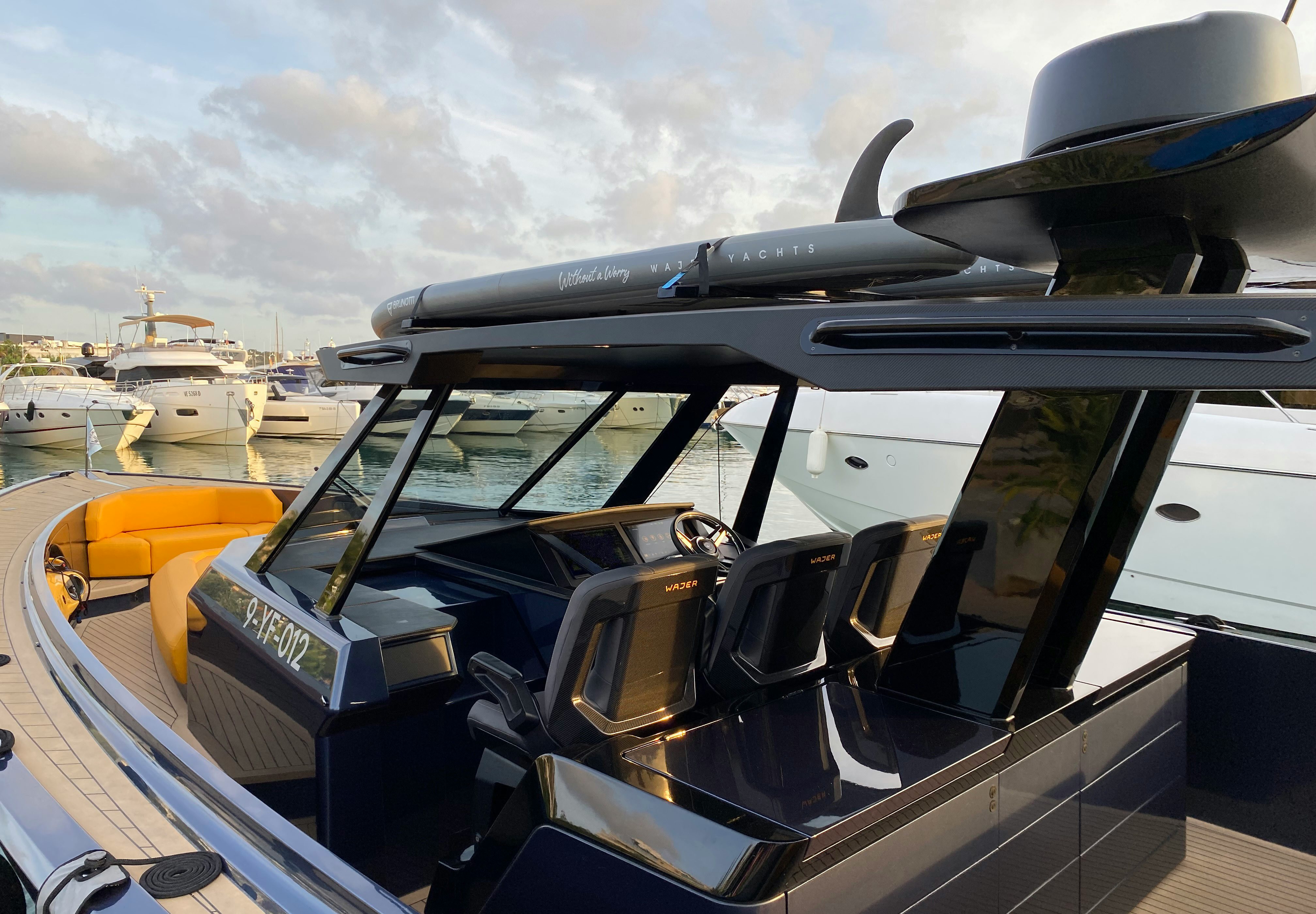 a plane on a deck aboard MONEYPENNY Yacht for Sale
