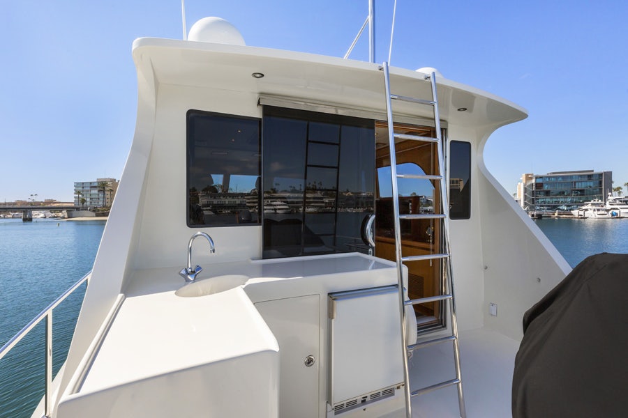 a boat with a sink and a ladder on the deck aboard PORK CHOP Yacht for Sale