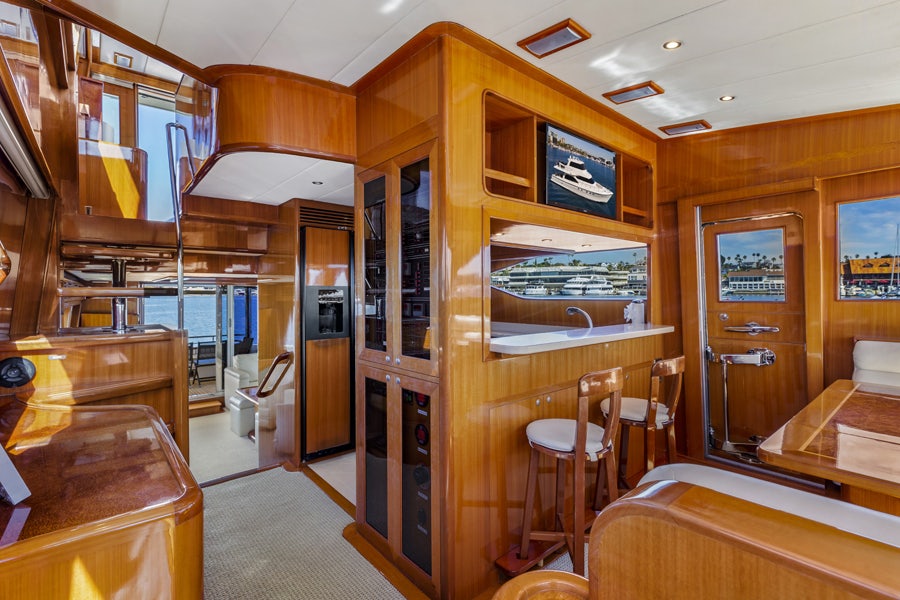 a room with a desk and chairs aboard PORK CHOP Yacht for Sale