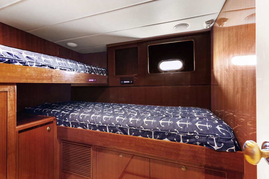 a computer on a cabinet aboard PORK CHOP Yacht for Sale