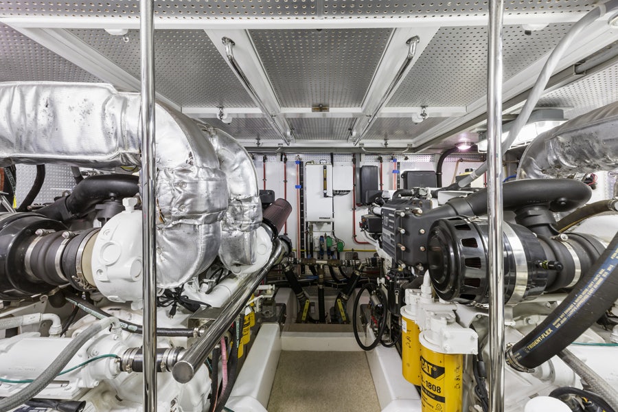 a large metal machine aboard PORK CHOP Yacht for Sale