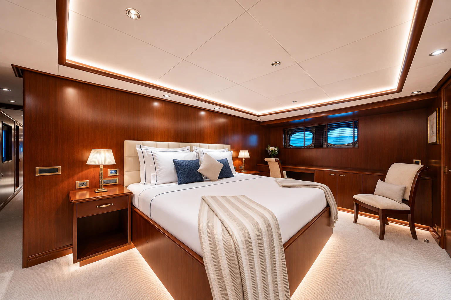 a room with a bed and a chair aboard ARIONAS Yacht for Charter