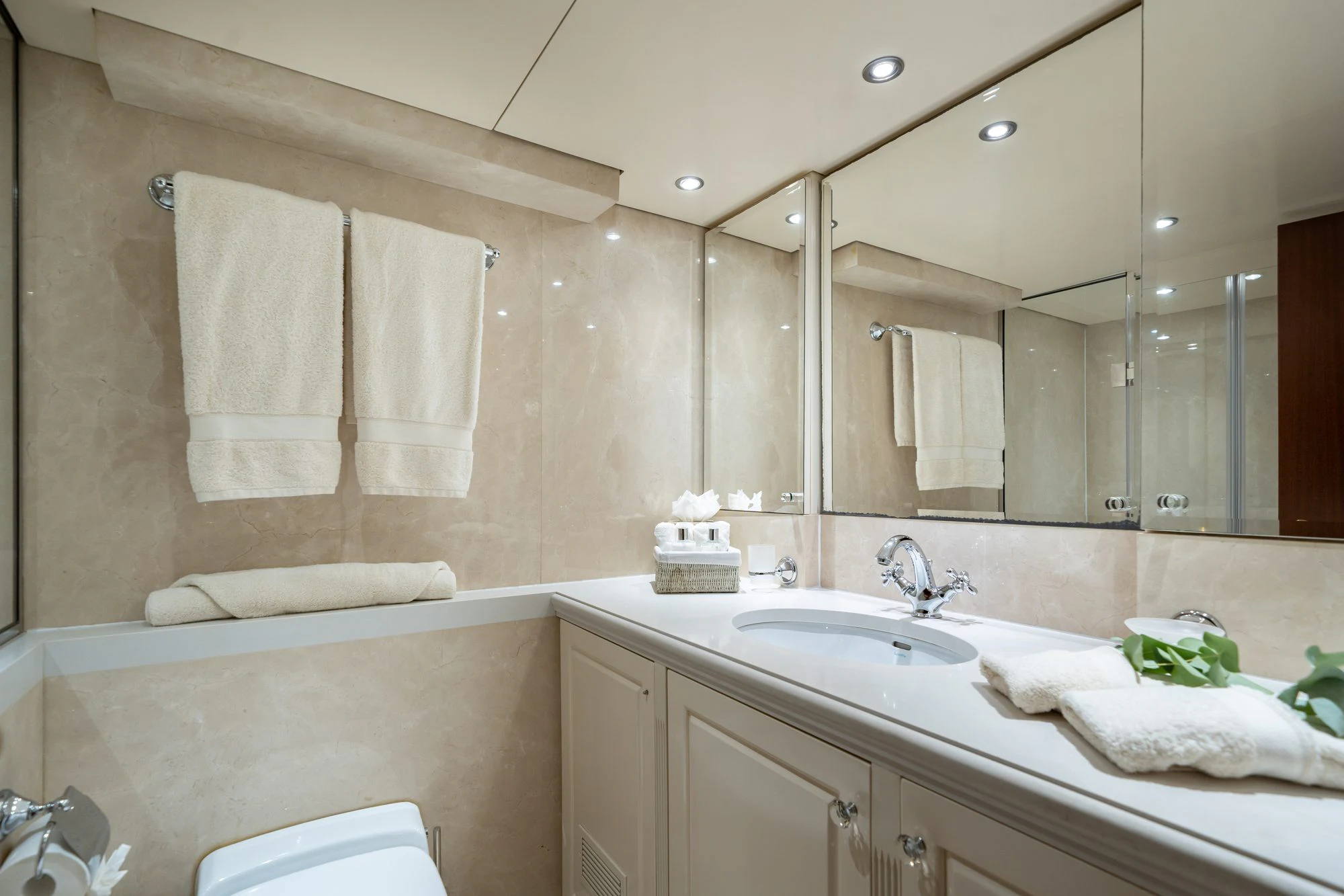 a bathroom with a large mirror aboard ARIONAS Yacht for Charter