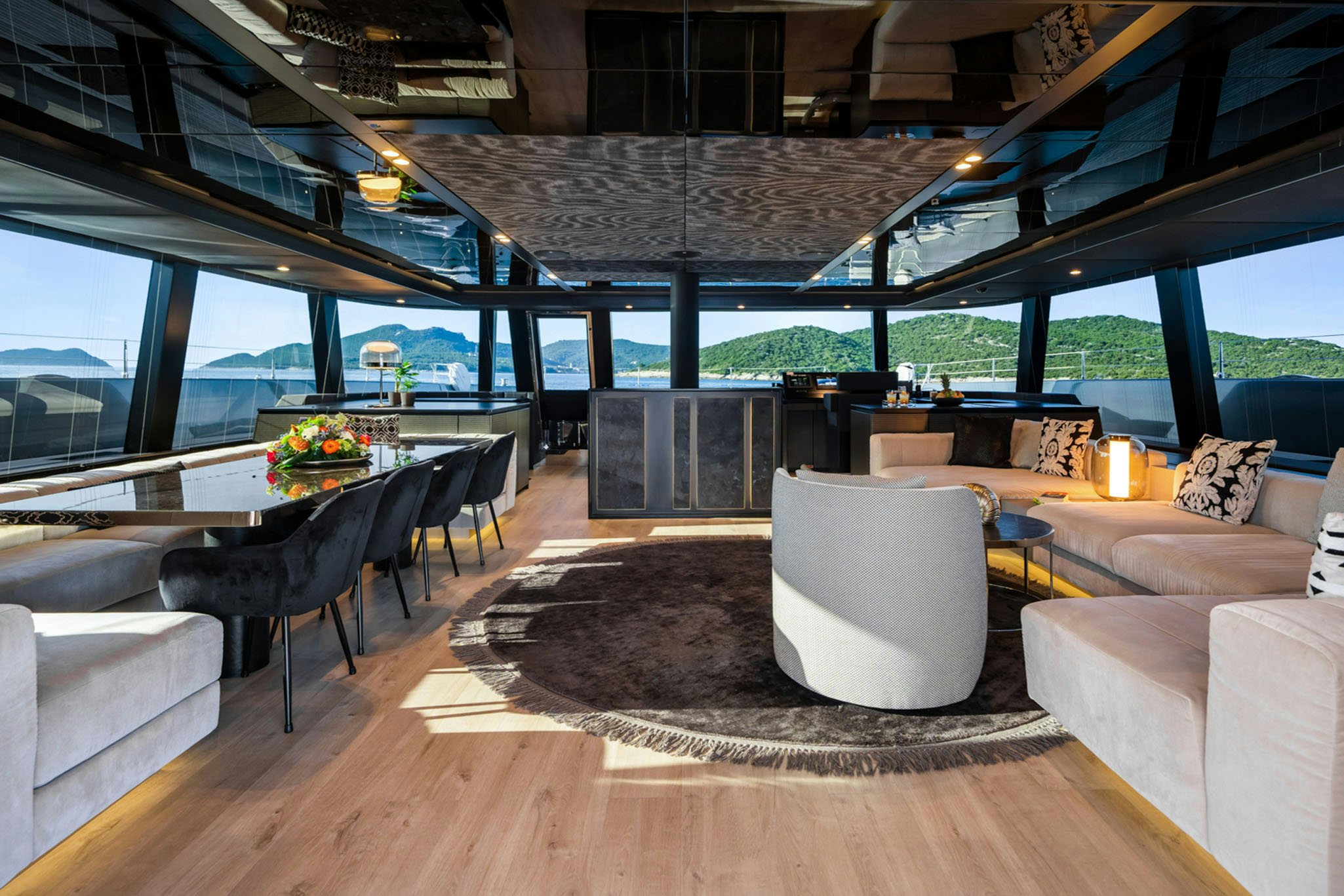 a living room with a large open roof aboard GRAYA Yacht for Charter