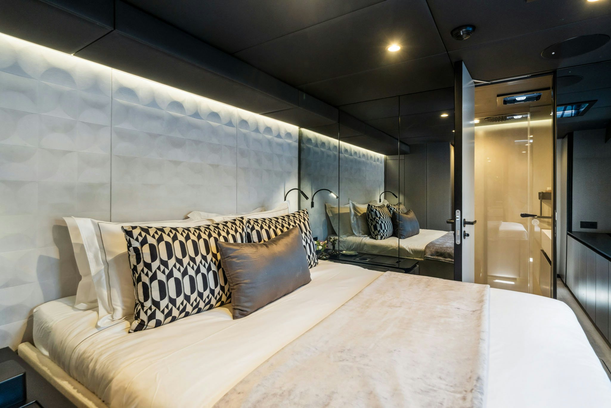 a bed in a room aboard GRAYA Yacht for Charter