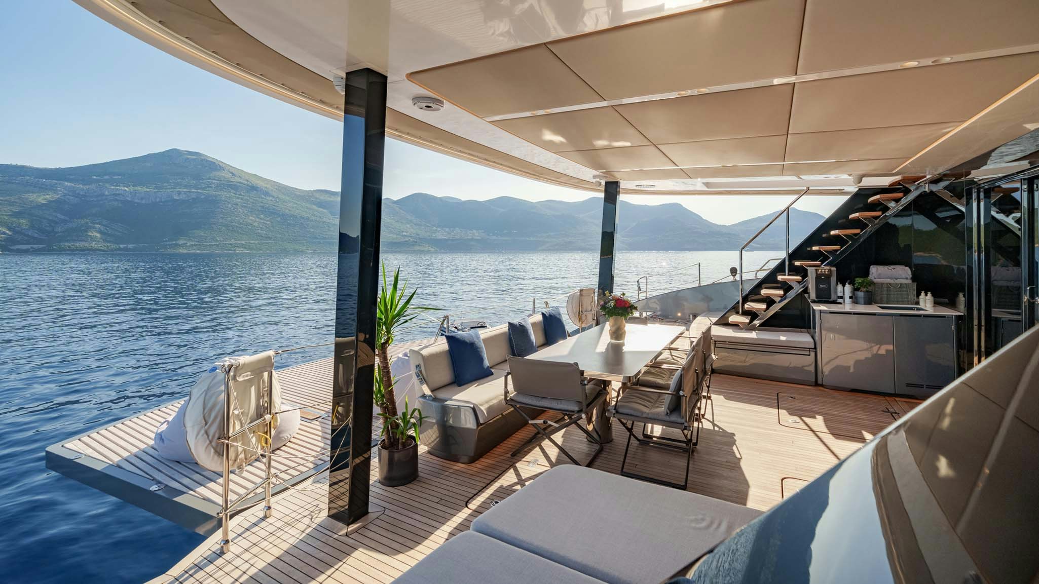 a room with a table and chairs on a boat aboard GRAYA Yacht for Charter