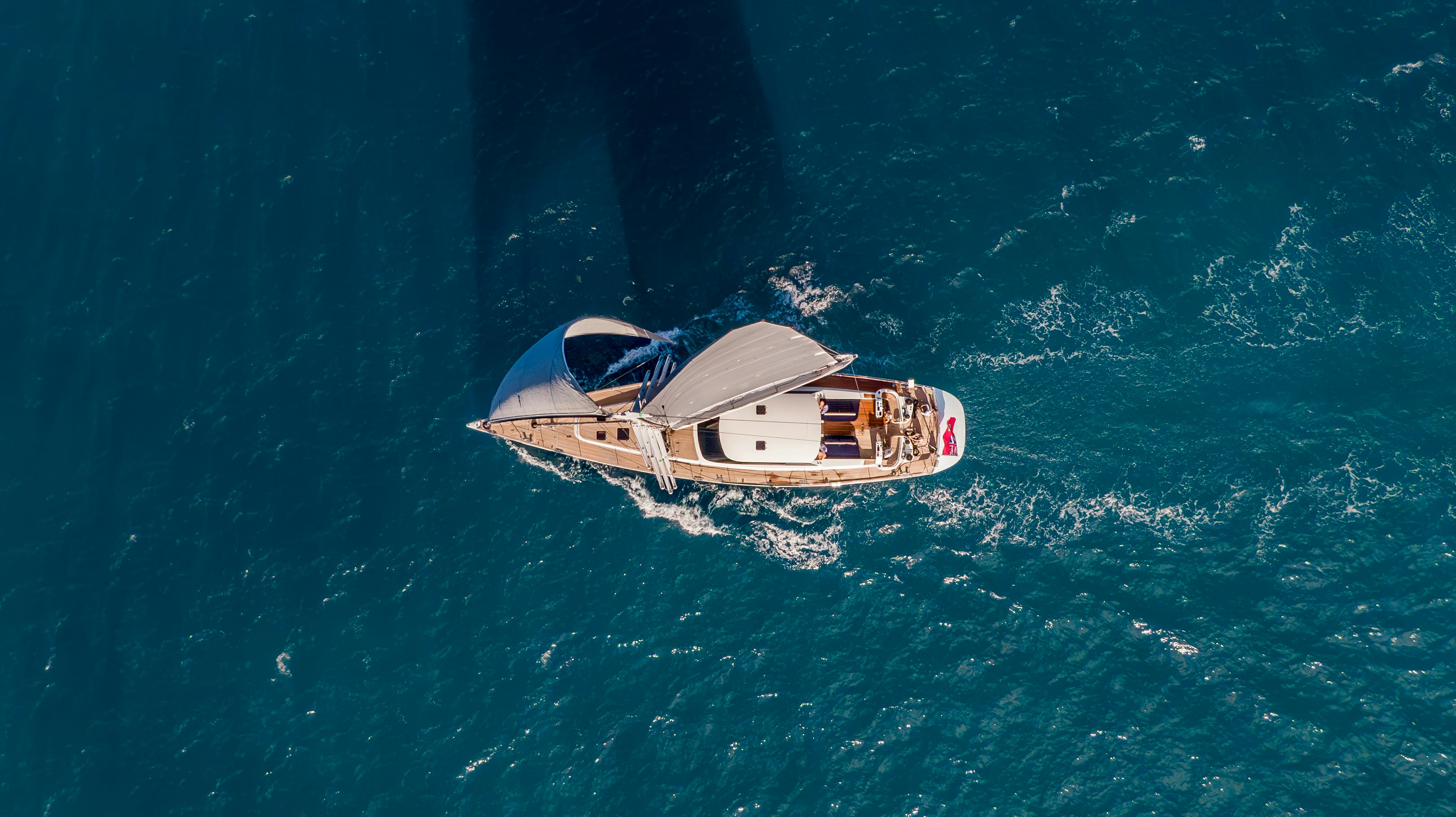 a boat in the water aboard LA JOIE DE MER Yacht for Sale