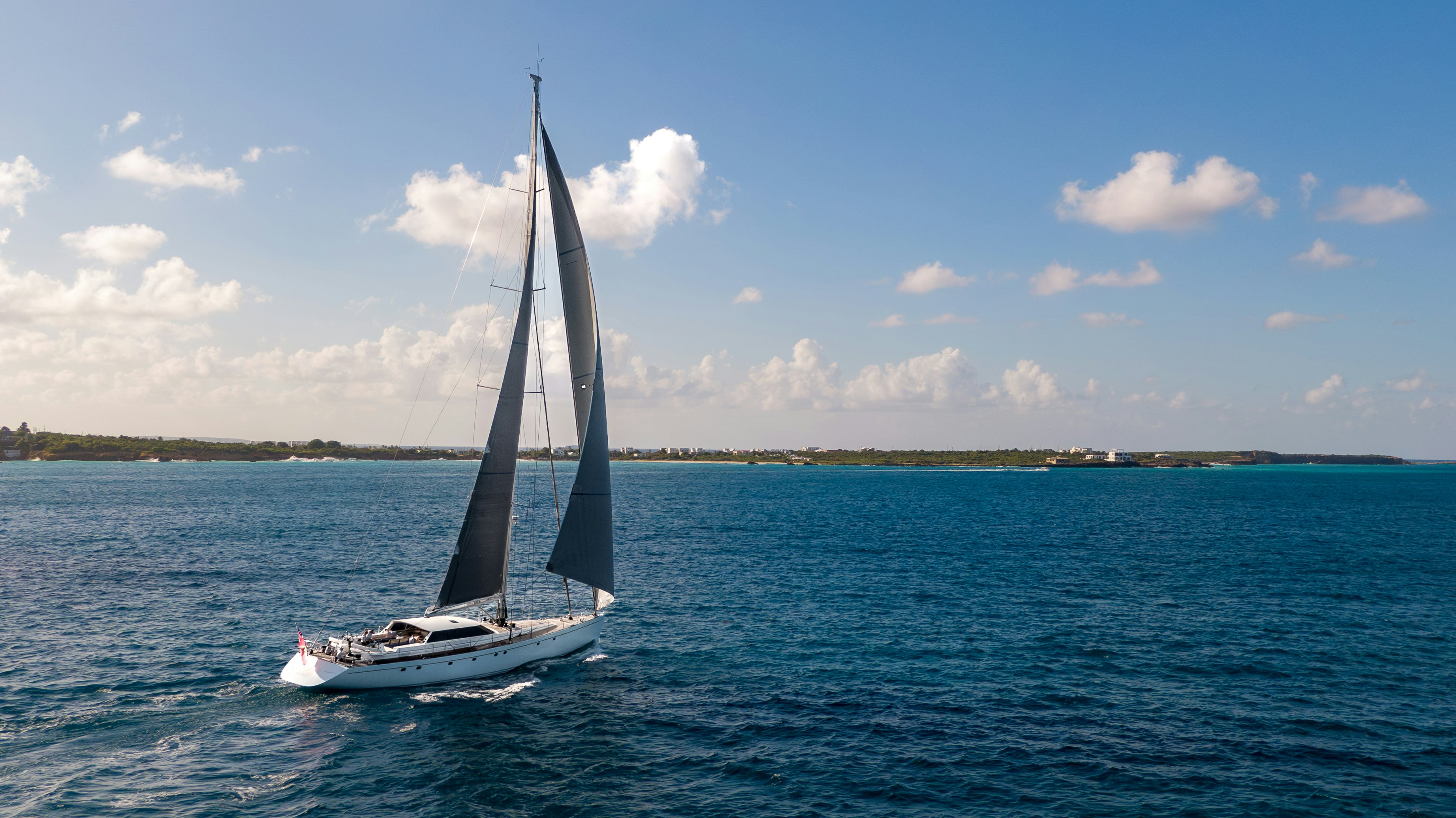 a sailboat on the water aboard LA JOIE DE MER Yacht for Sale