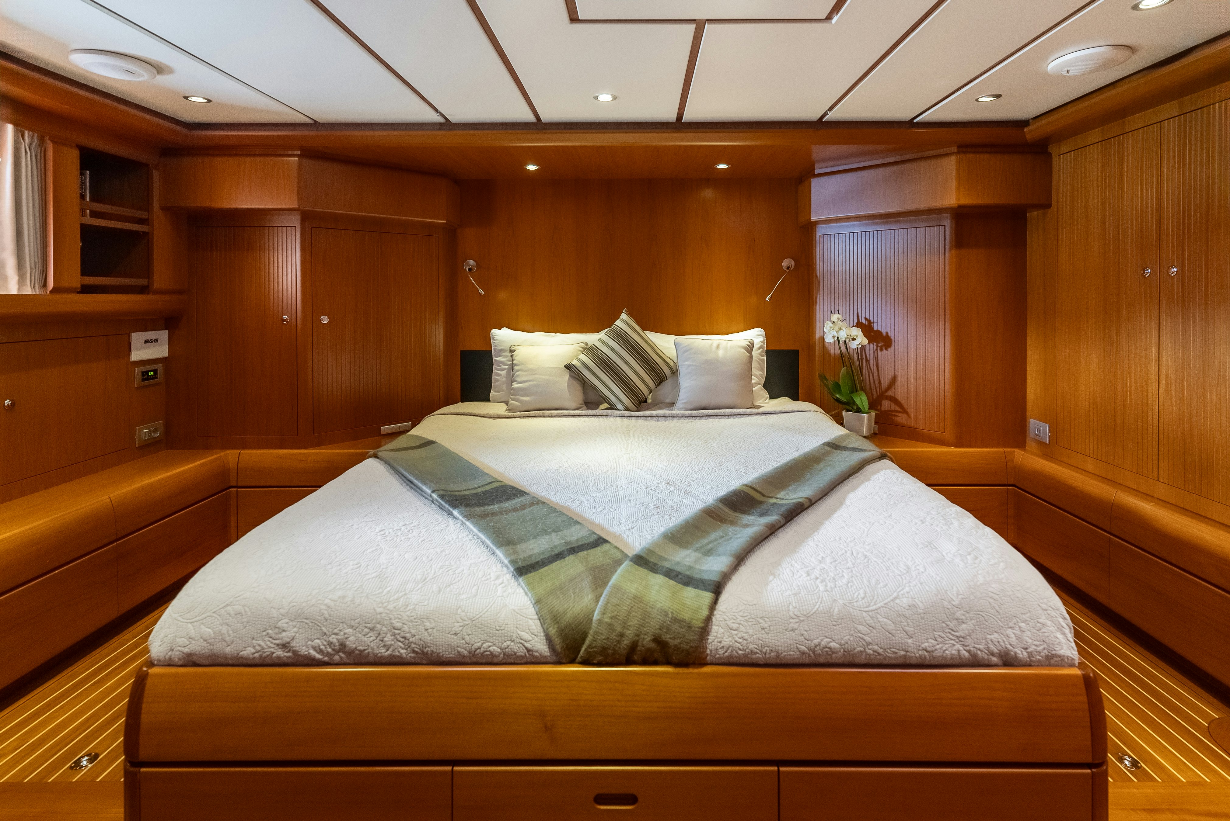 a bed in a room aboard LA JOIE DE MER Yacht for Sale