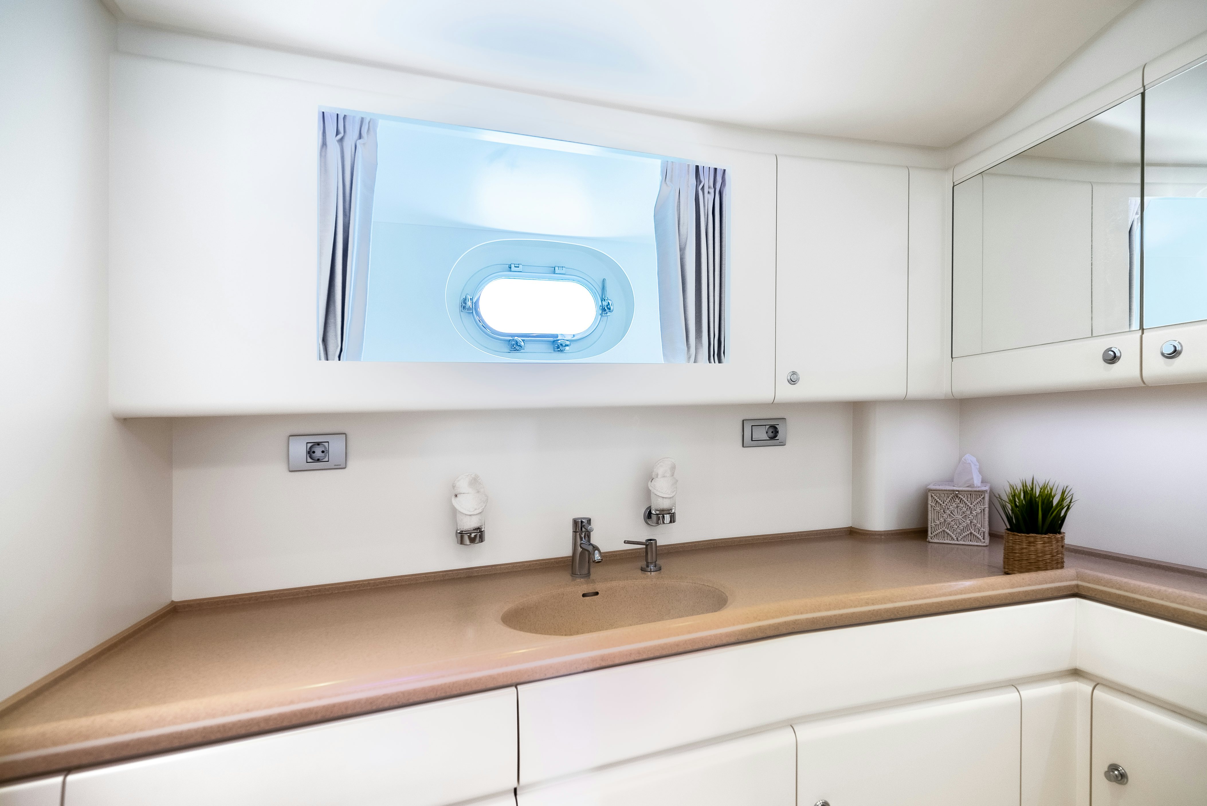 a kitchen with a blue microwave aboard LA JOIE DE MER Yacht for Sale