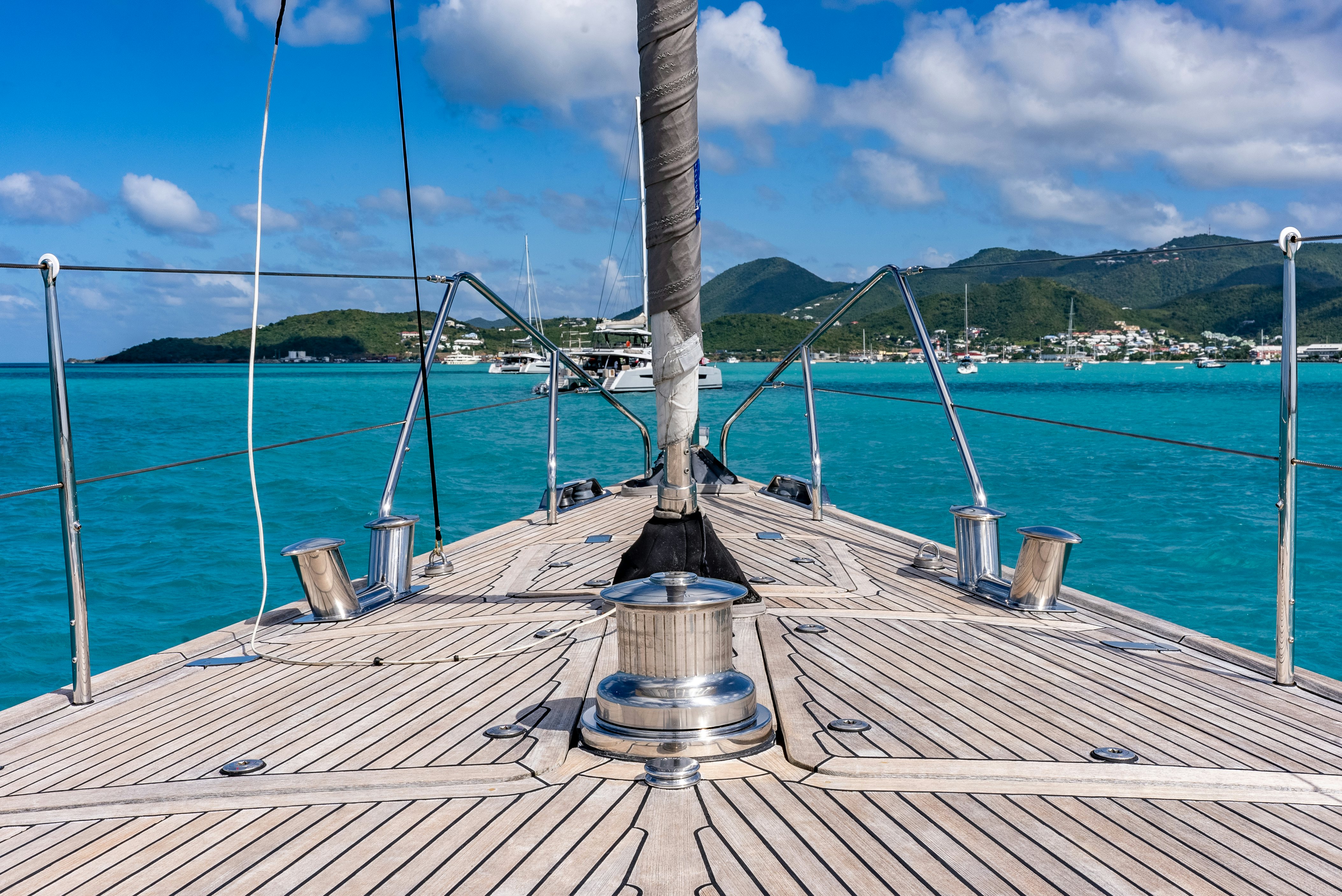 a dock with a boat in the background aboard LA JOIE DE MER Yacht for Sale