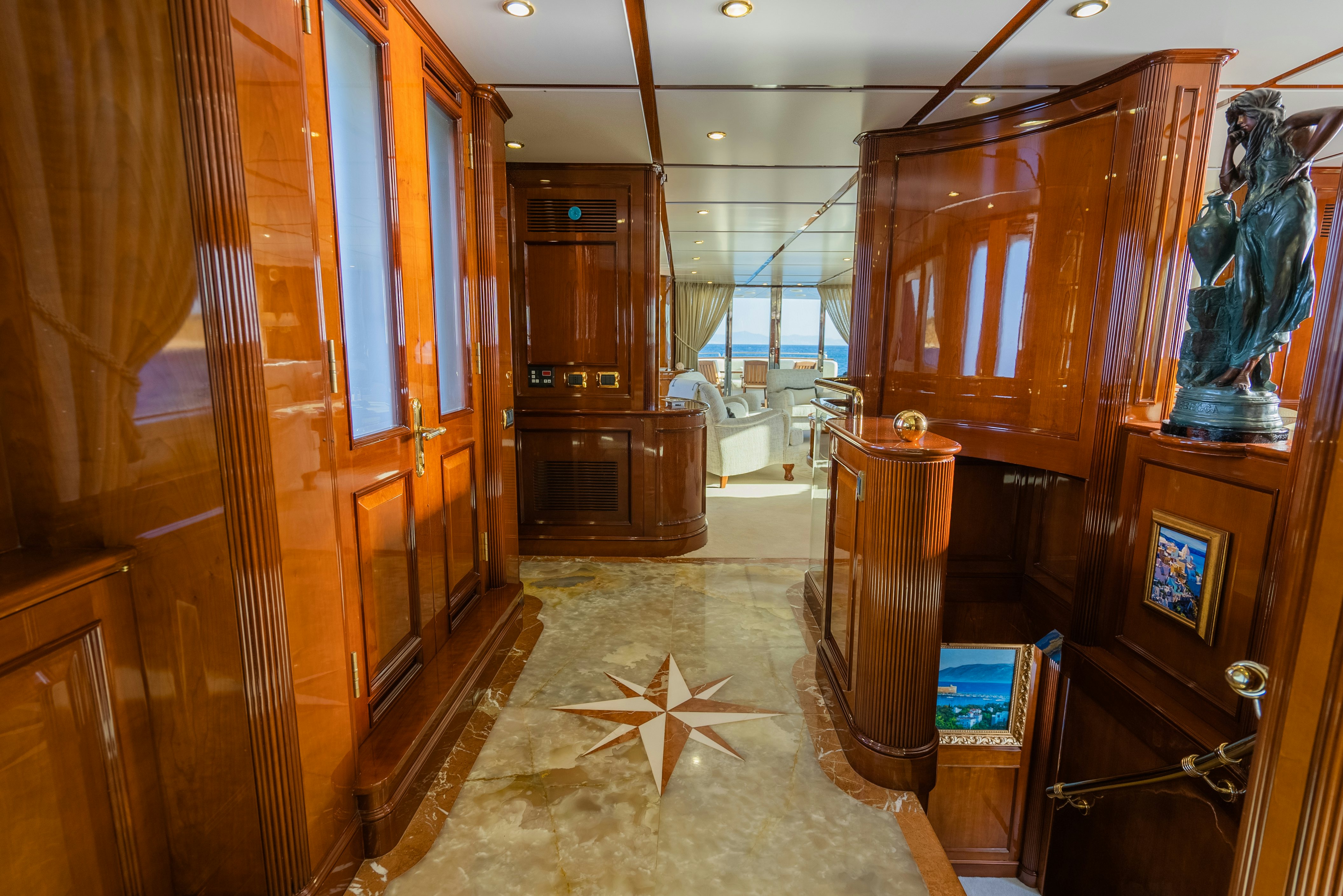 a room with wooden cabinets aboard STELLA FIERA Yacht for Sale