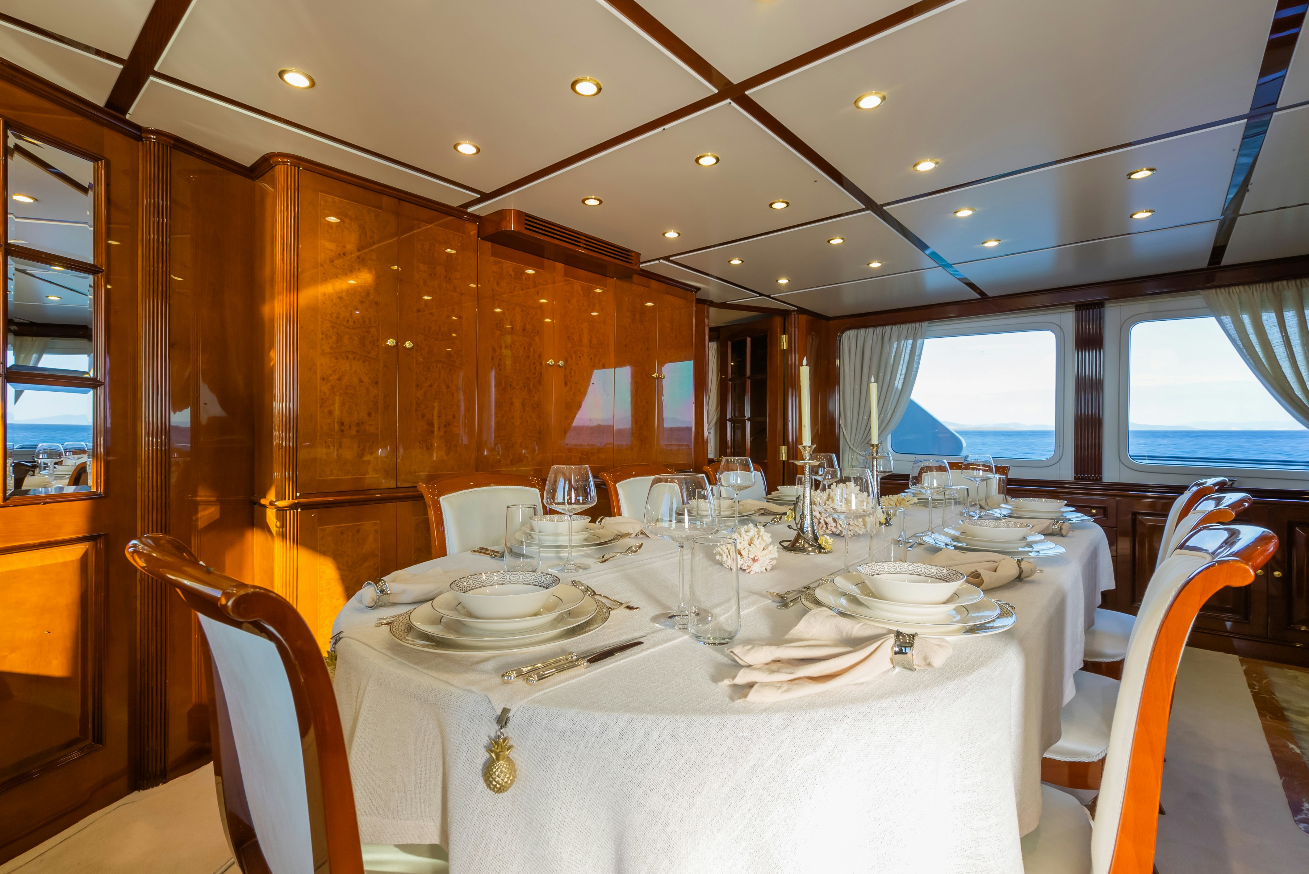 a table set for a dinner aboard STELLA FIERA Yacht for Sale