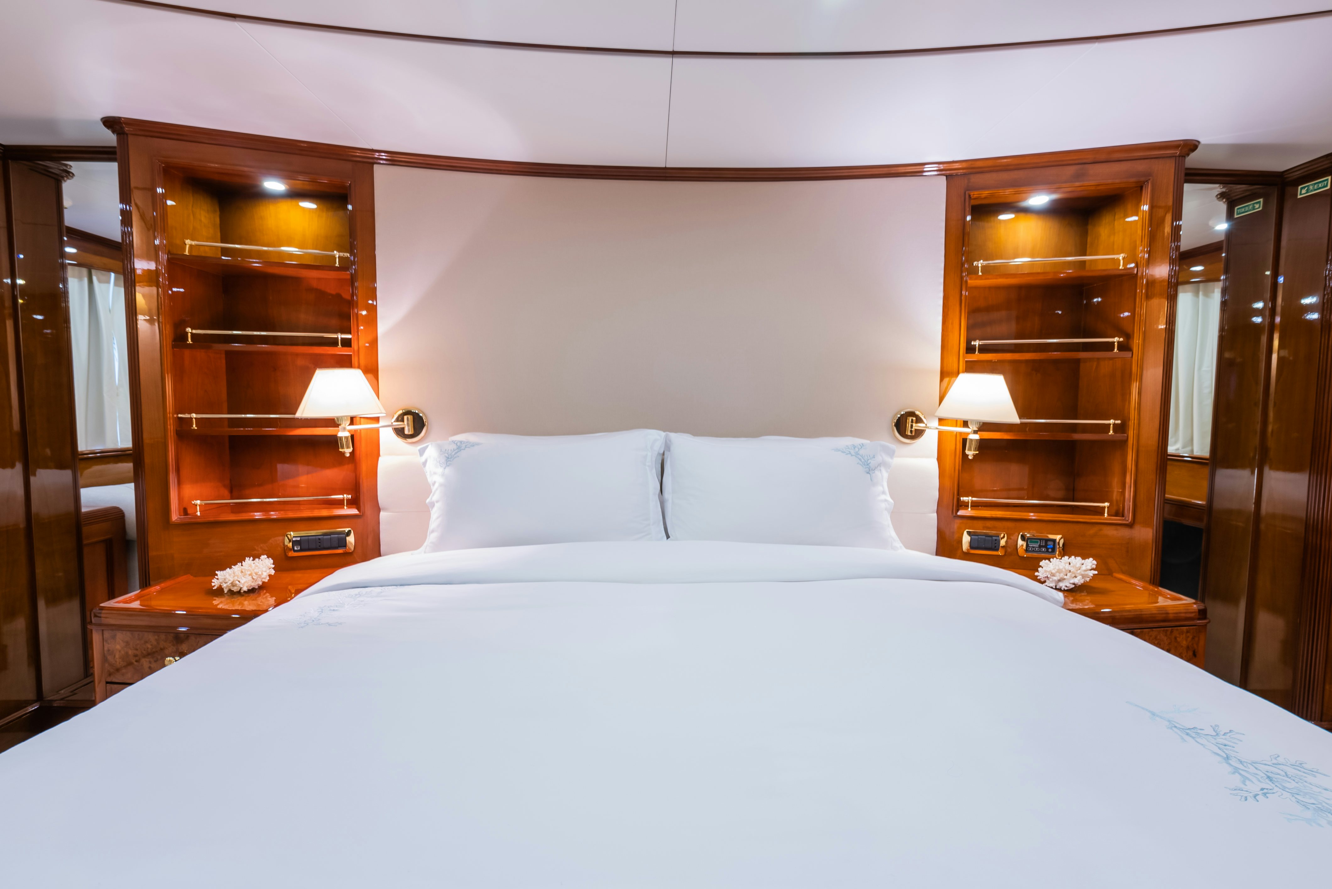 a bed with white sheets aboard STELLA FIERA Yacht for Sale