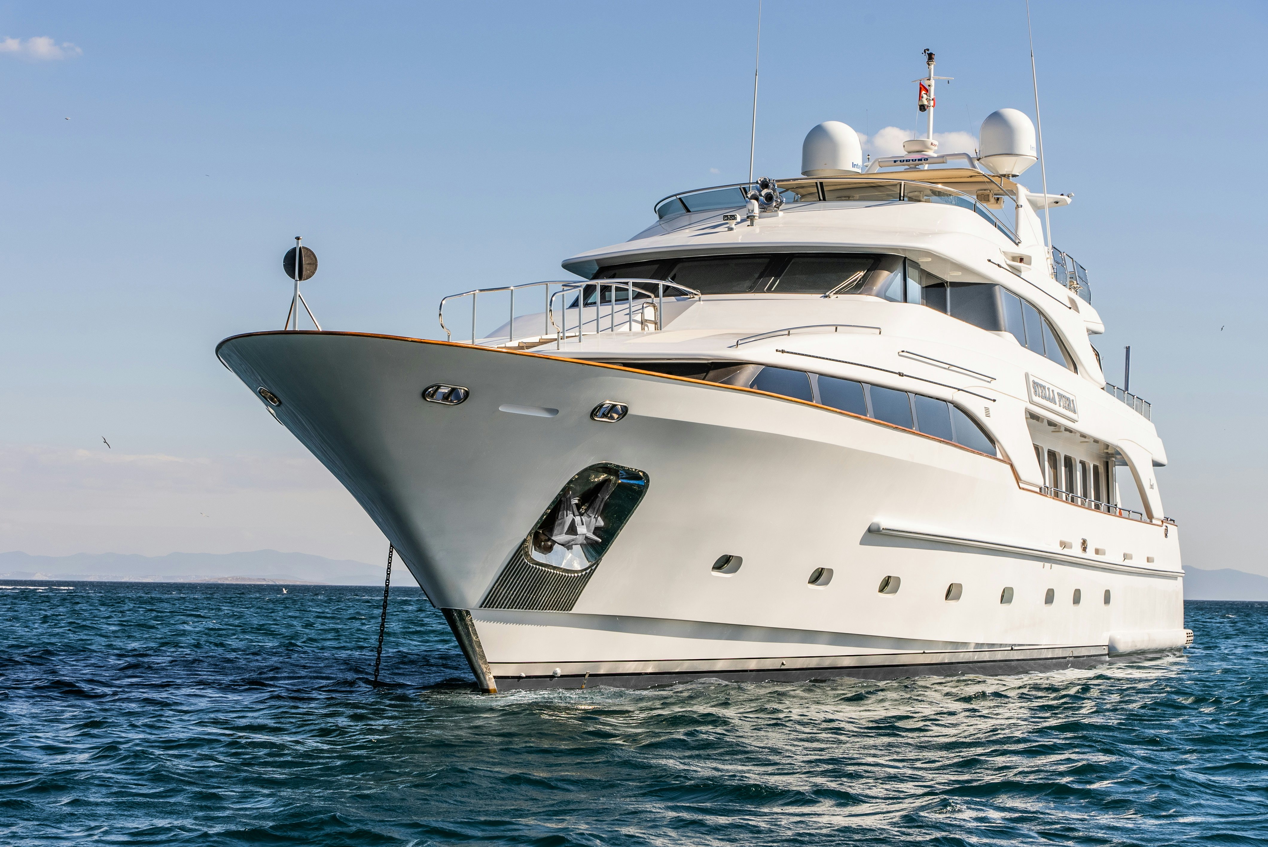 a white yacht in the water aboard STELLA FIERA Yacht for Sale
