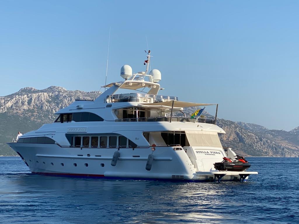 a large white boat in the water aboard STELLA FIERA Yacht for Sale