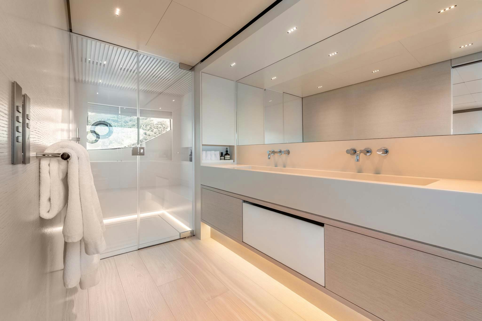 a bathroom with a large mirror aboard PALOMA Yacht for Charter