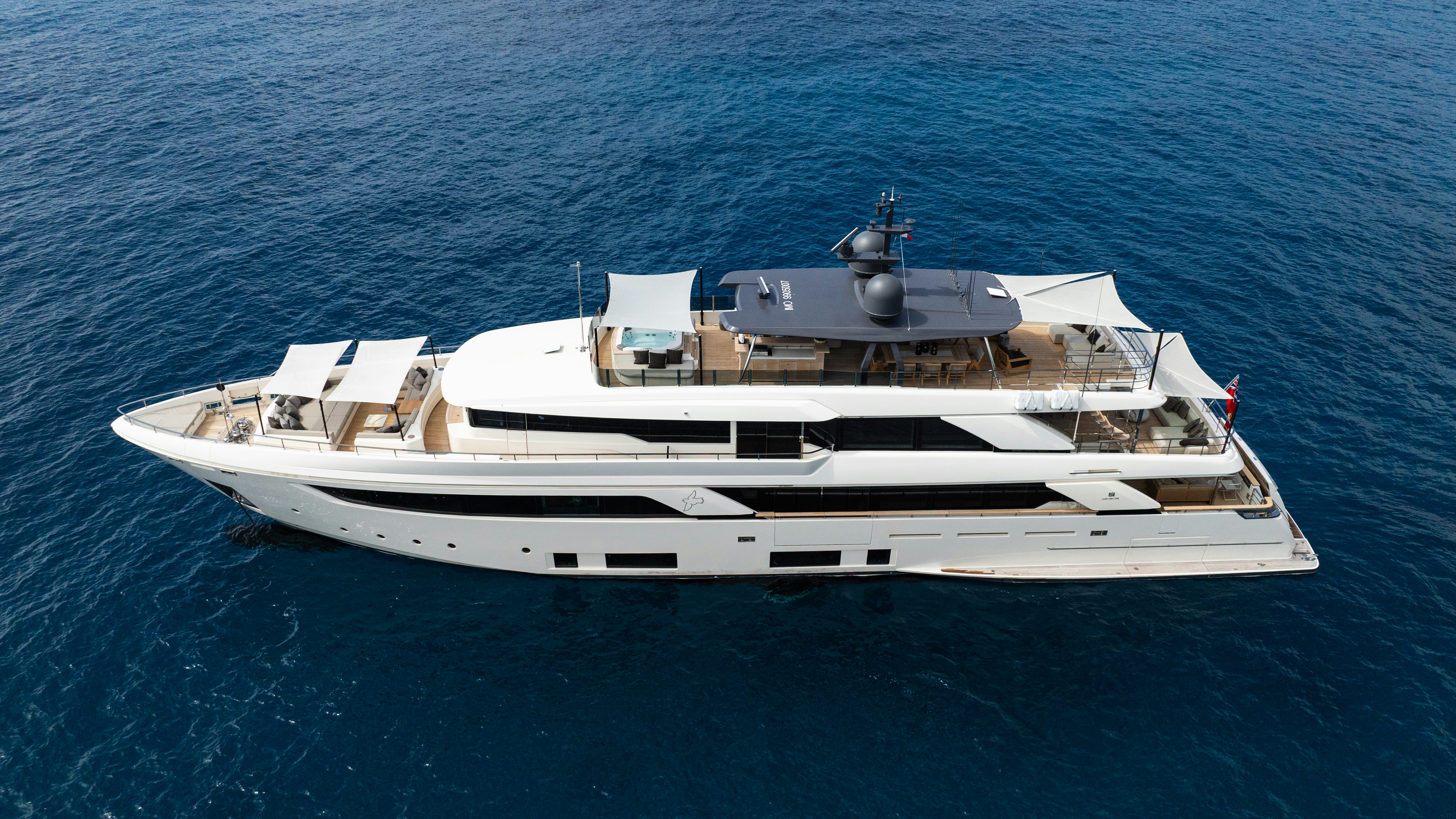 a white boat in the water aboard PALOMA Yacht for Charter