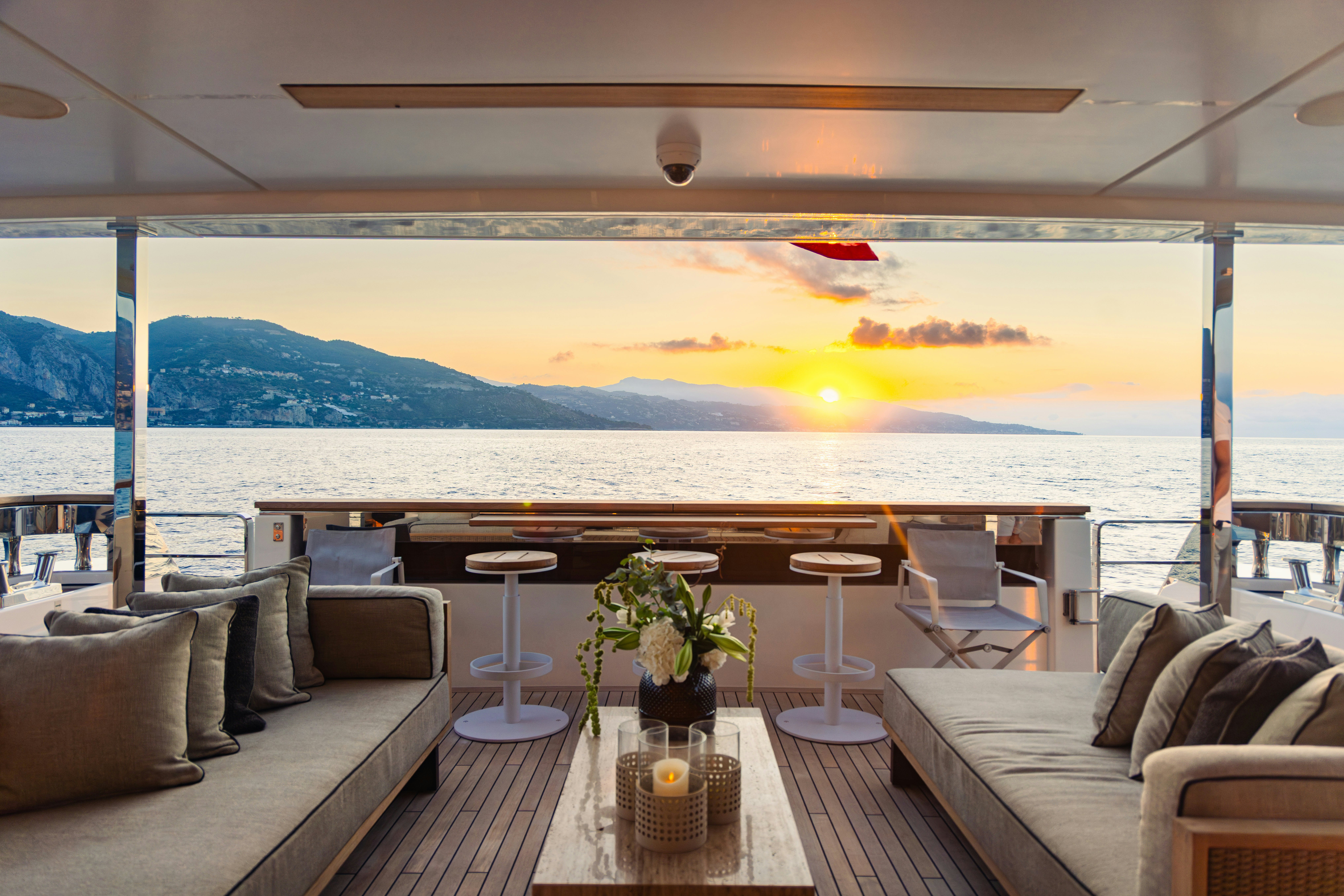 a large balcony overlooking a body of water aboard PALOMA Yacht for Charter
