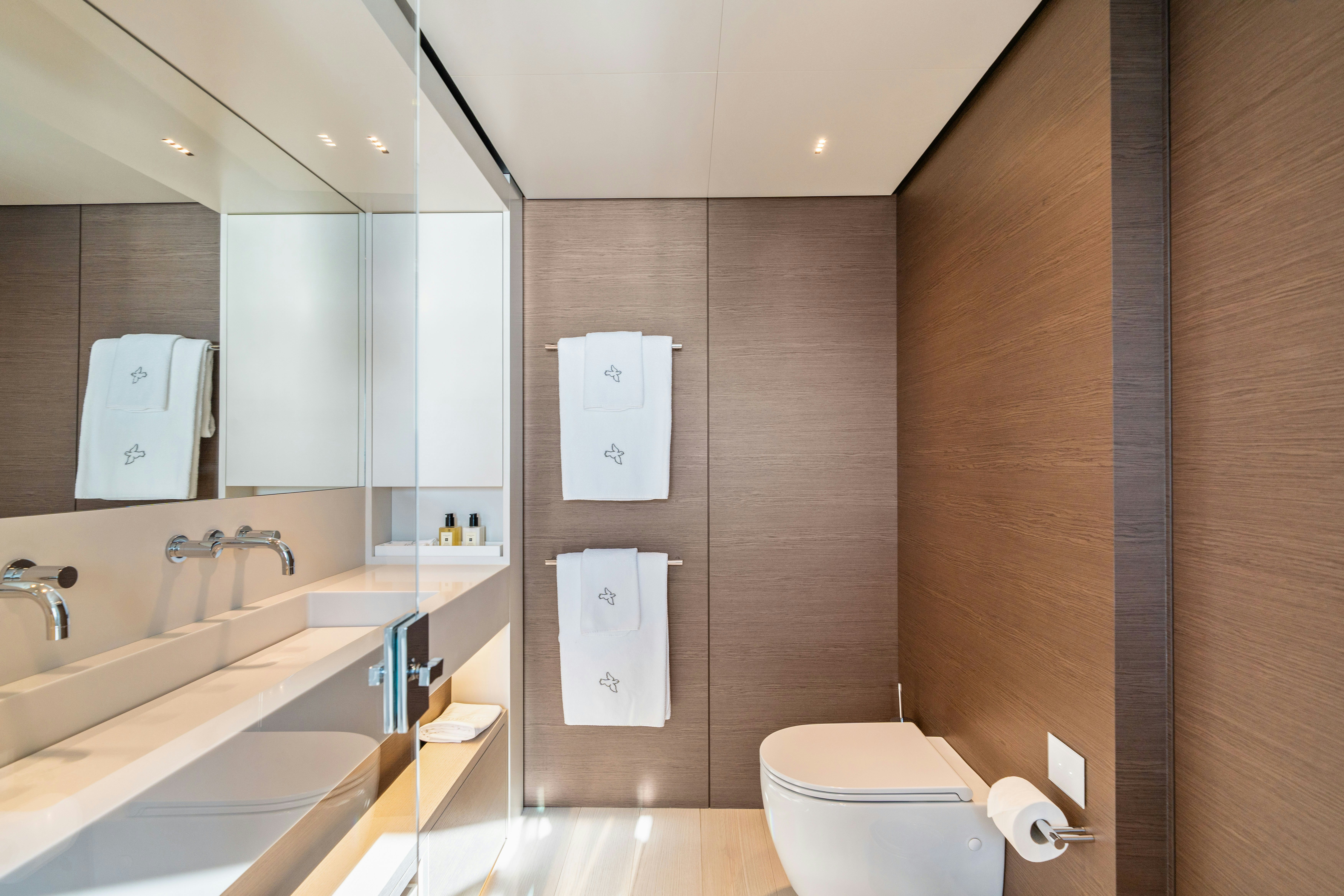 a bathroom with a sink and a toilet aboard PALOMA Yacht for Charter