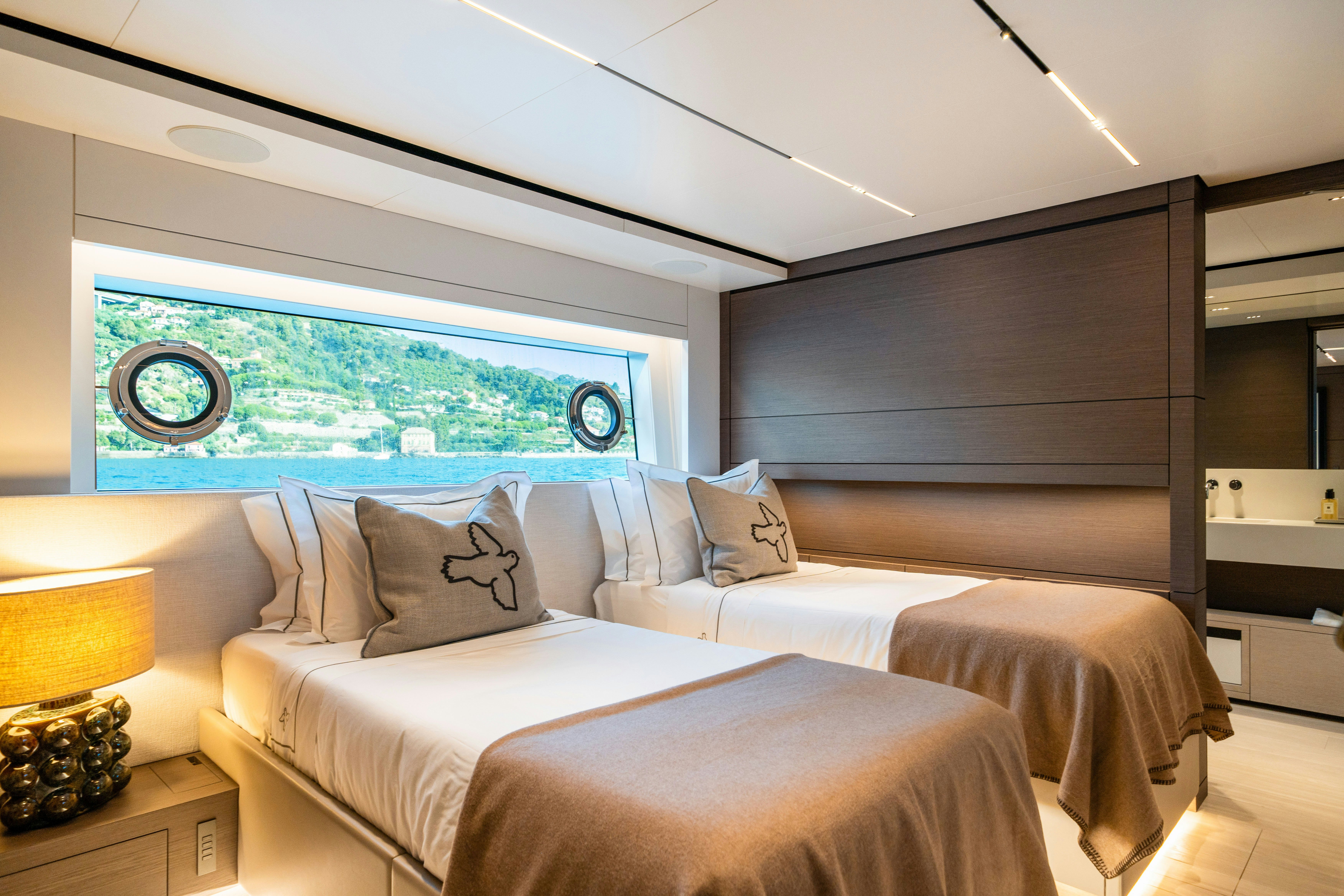 a large bed in a room aboard PALOMA Yacht for Charter