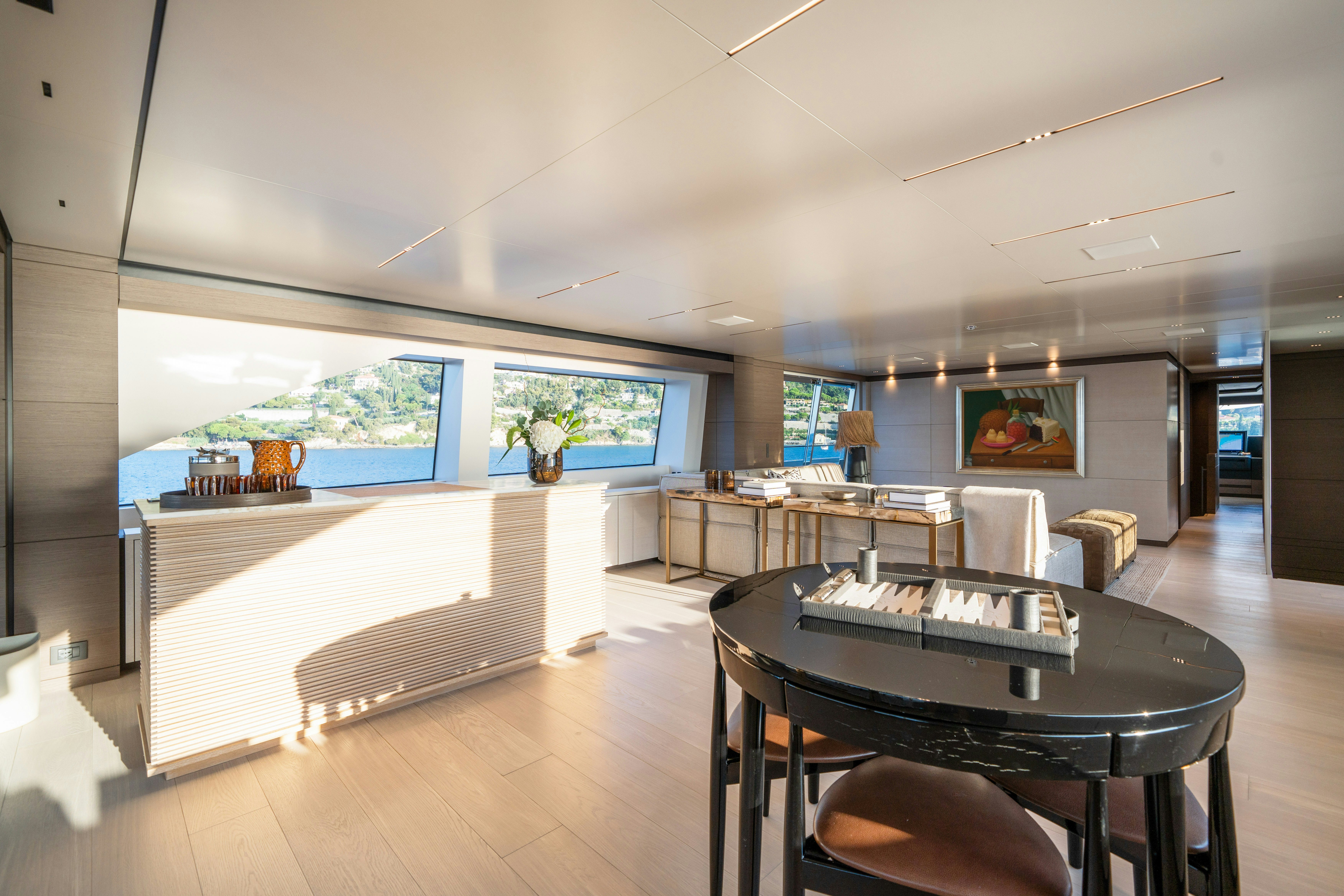 a room with a table and chairs aboard PALOMA Yacht for Charter
