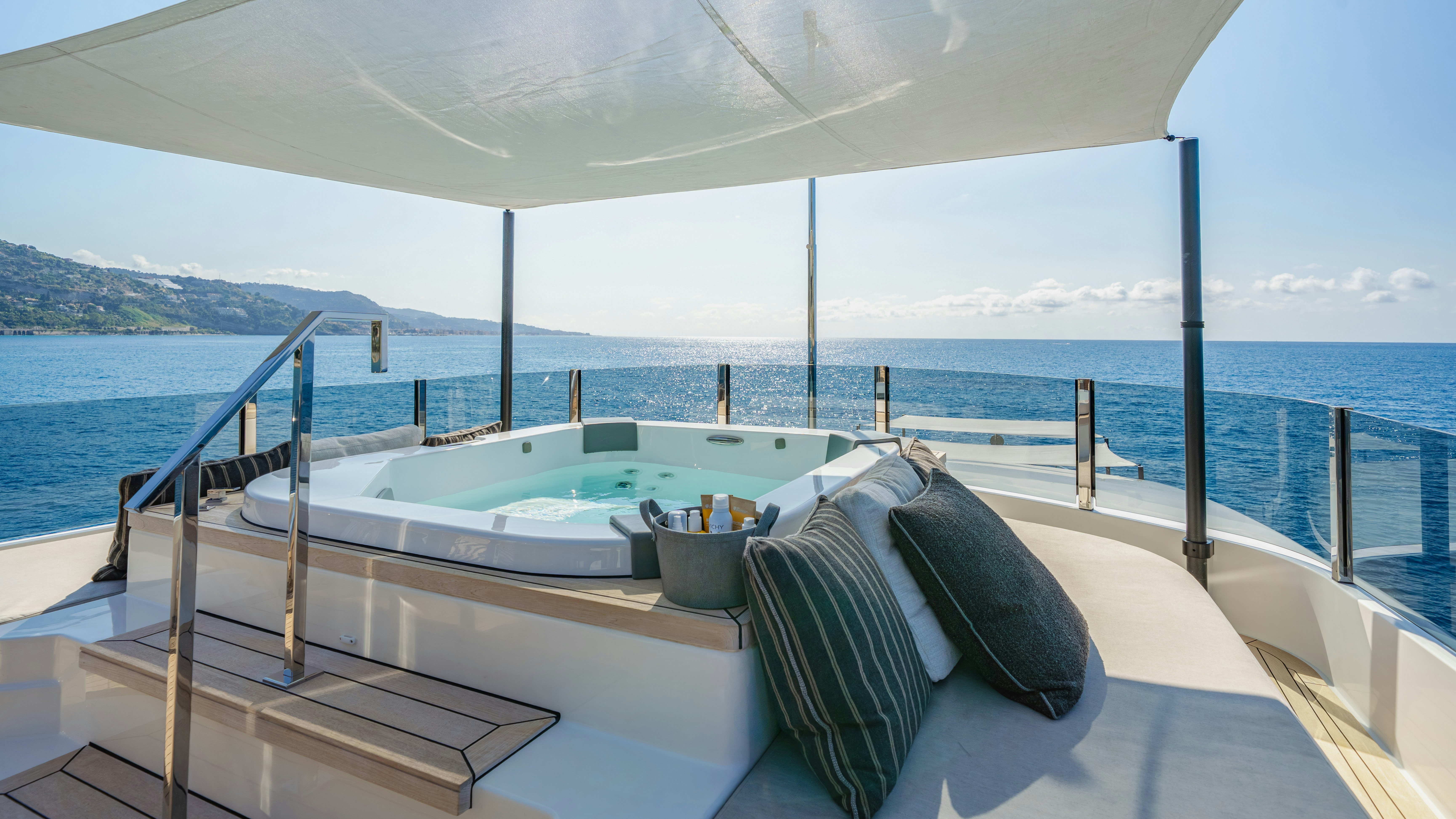 a large white bed on a boat aboard PALOMA Yacht for Charter