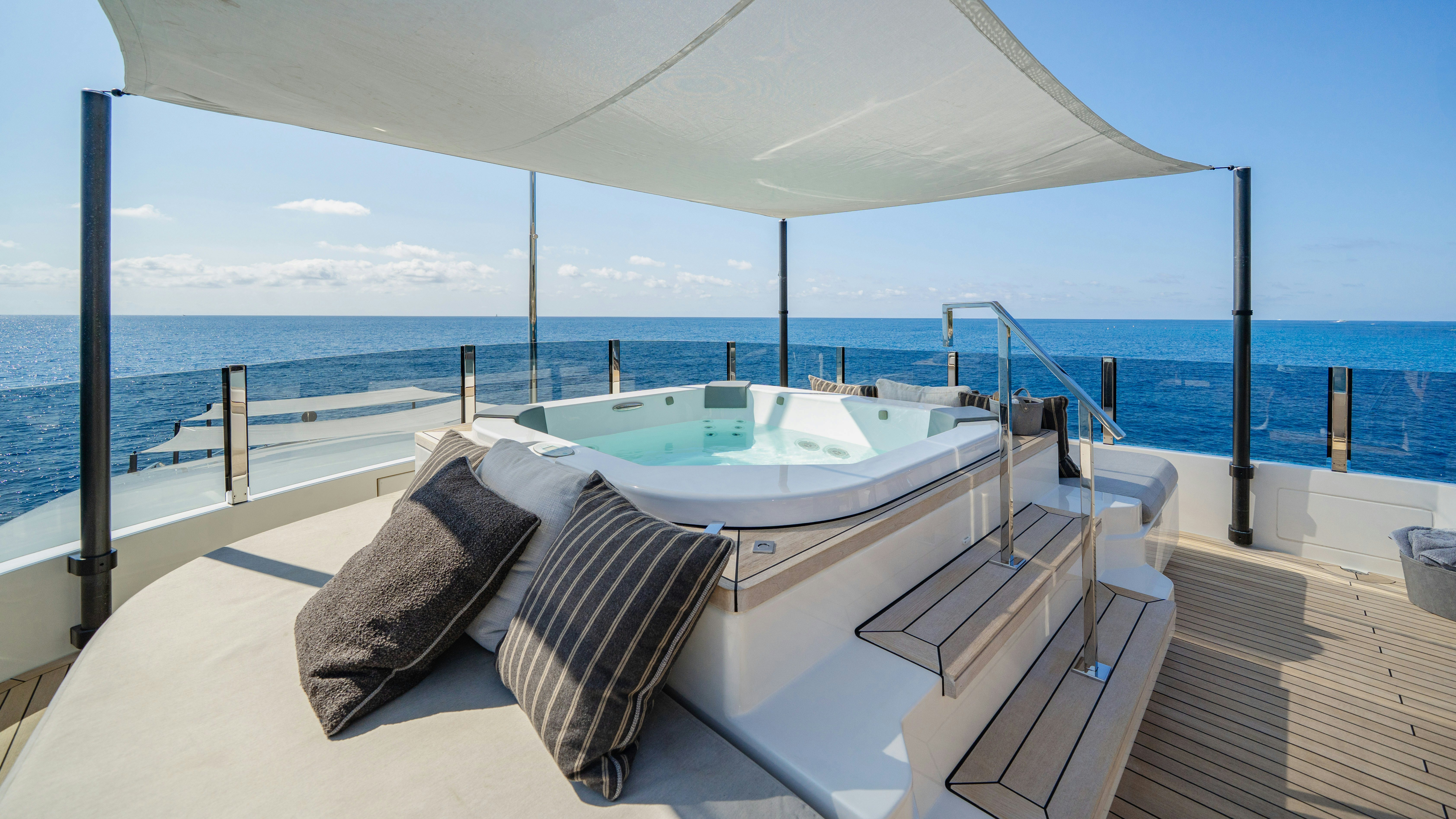 a bed on a deck aboard PALOMA Yacht for Charter