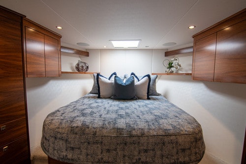 a bed in a room aboard CABALLO GRANDE Yacht for Sale