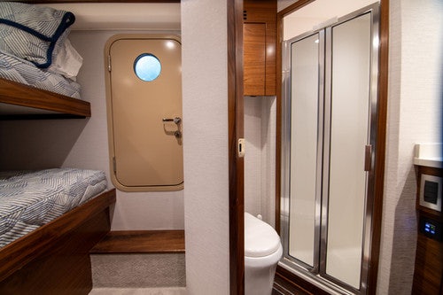 a bathroom with a glass shower aboard CABALLO GRANDE Yacht for Sale