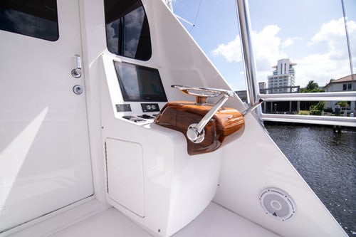 a white car with a keychain on the front aboard CABALLO GRANDE Yacht for Sale