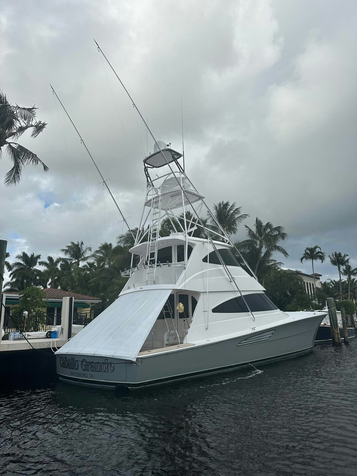 a white boat in the water aboard CABALLO GRANDE Yacht for Sale