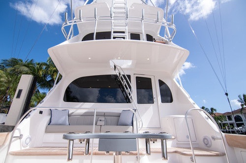 a white boat on a deck aboard CABALLO GRANDE Yacht for Sale