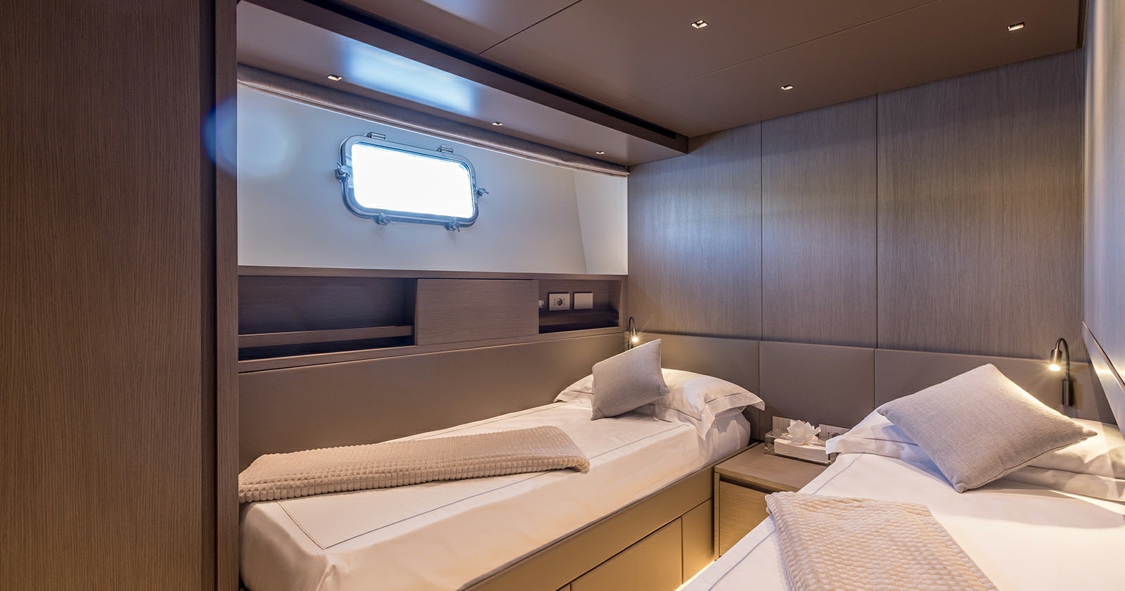 a room with two beds aboard JICJ Yacht for Sale