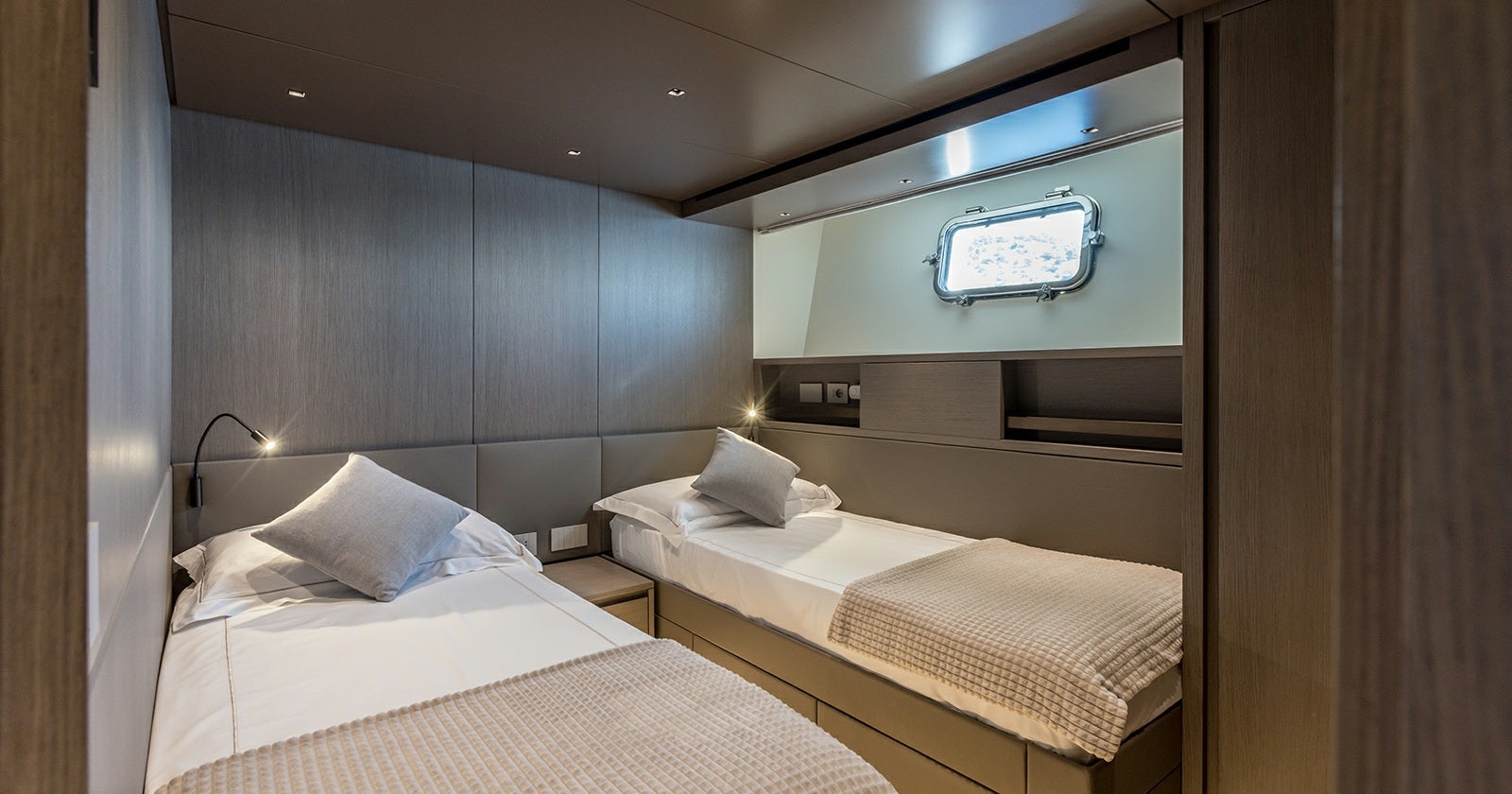 a room with two beds aboard JICJ Yacht for Sale