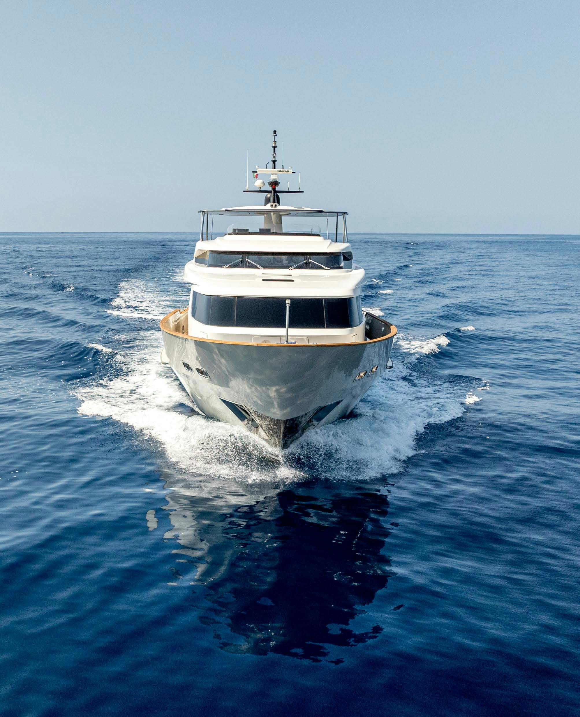 a boat on the water aboard SERENITY IV Yacht for Sale