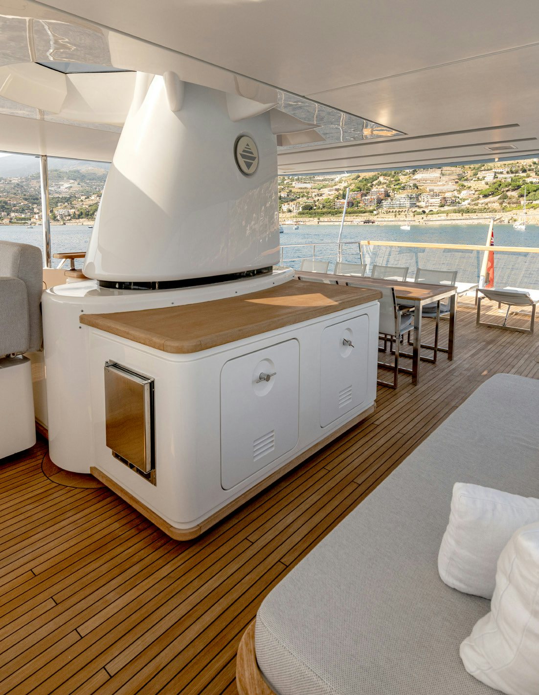 a large white machine on a wooden surface aboard SERENITY IV Yacht for Sale