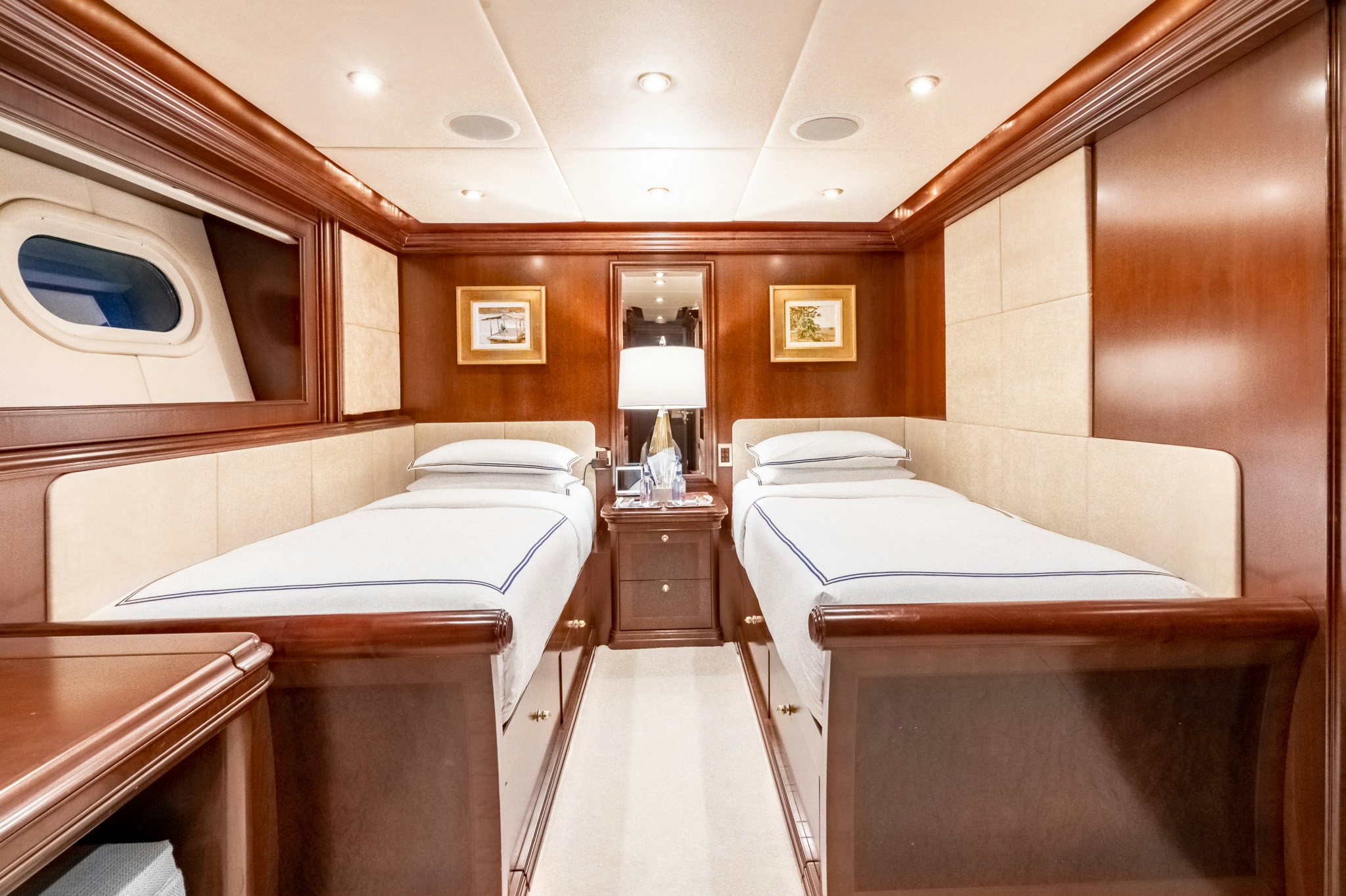 a room with two beds aboard ZOOM ZOOM ZOOM Yacht for Charter