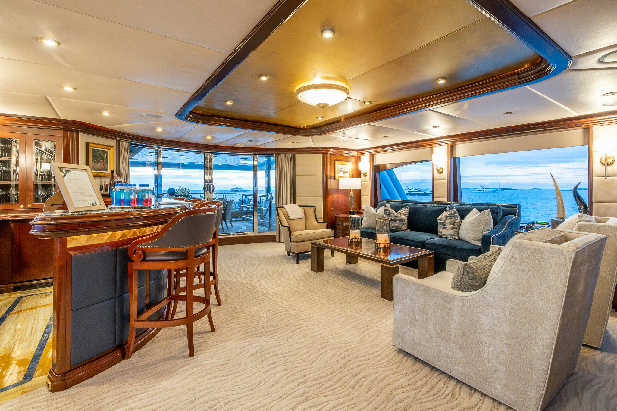 a living room with a large window aboard ZOOM ZOOM ZOOM Yacht for Charter