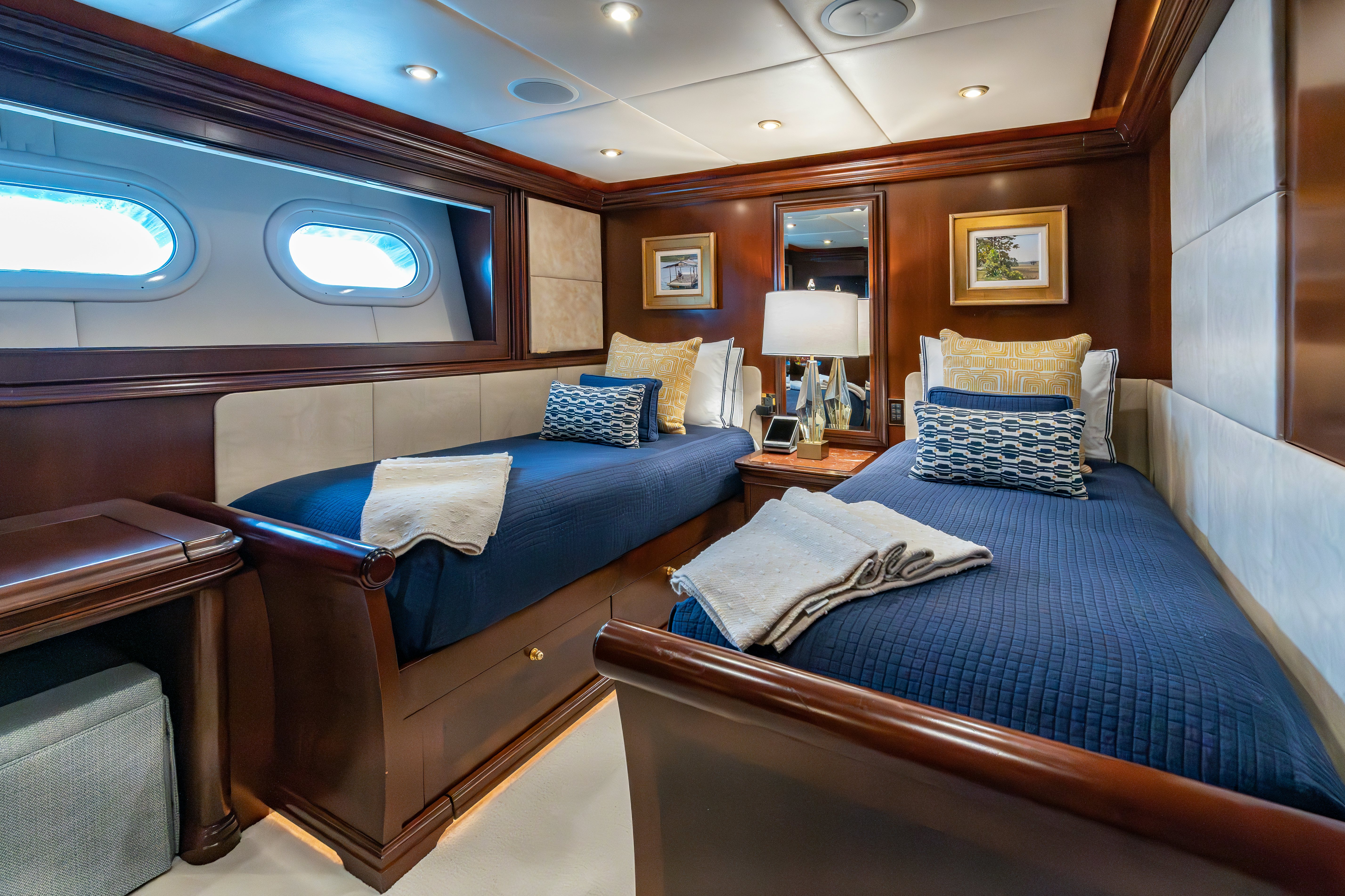 a room with a bed and a couch aboard ZOOM ZOOM ZOOM Yacht for Charter
